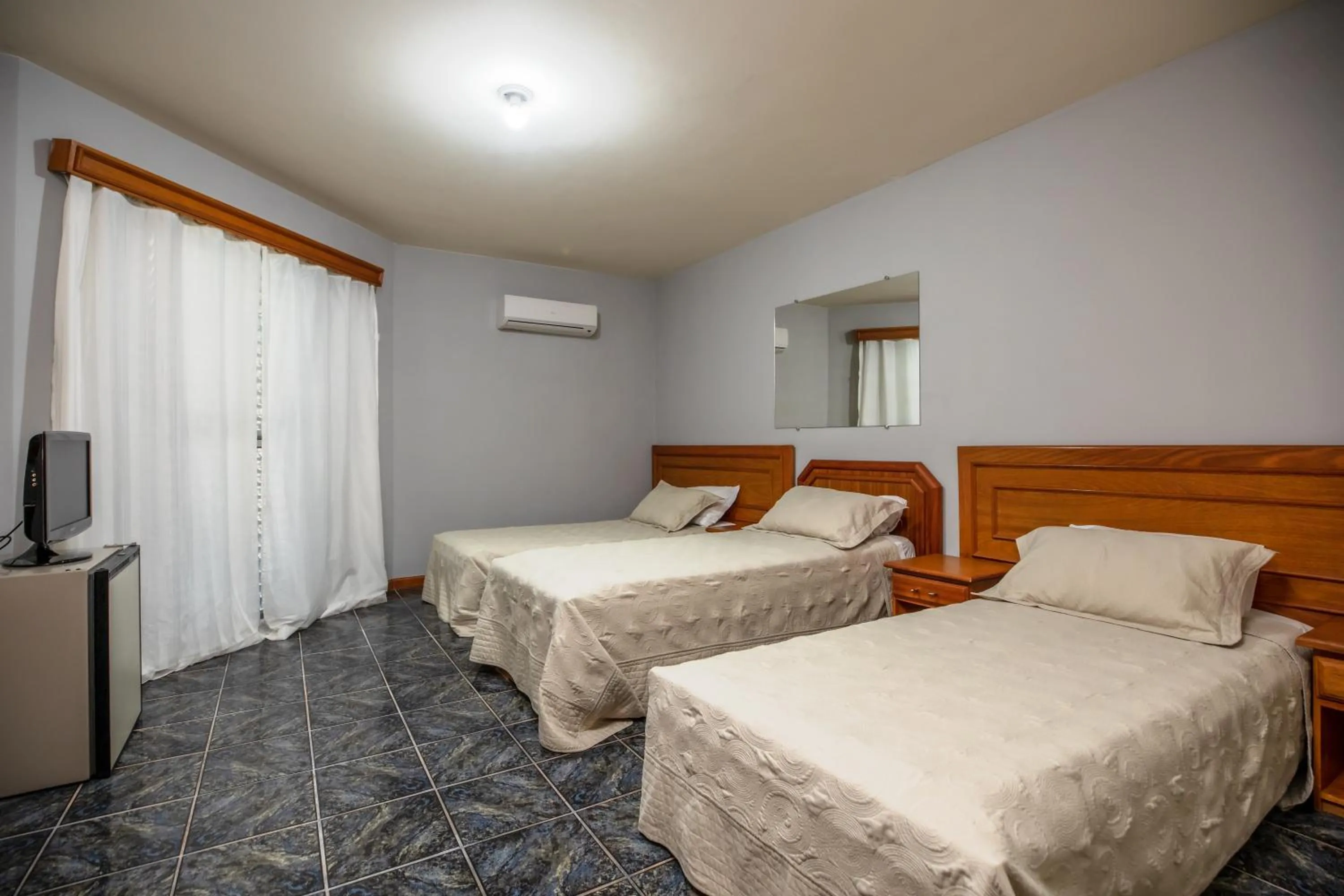 Bed in Canzi Cataratas Hotel