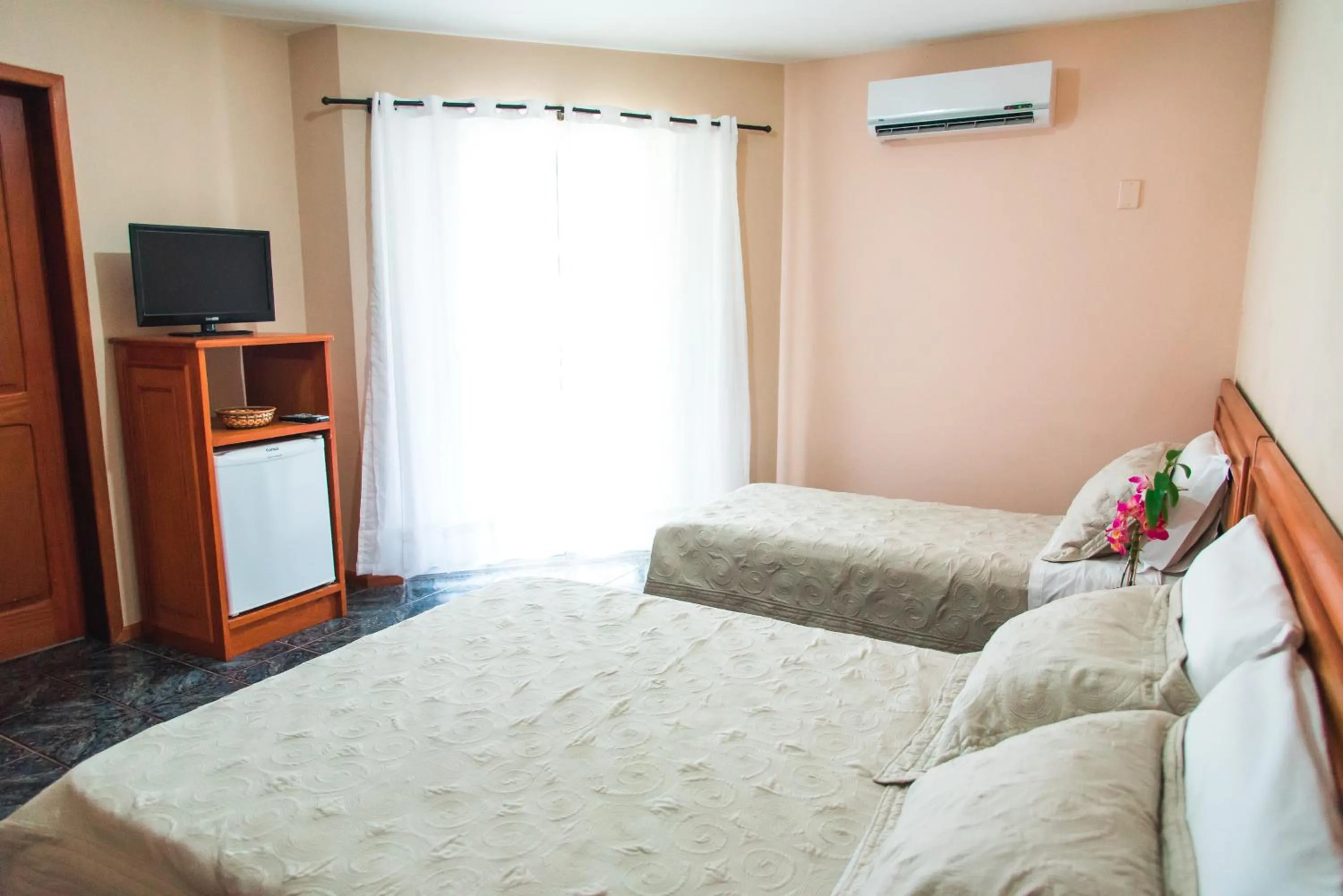 Bed in Canzi Cataratas Hotel