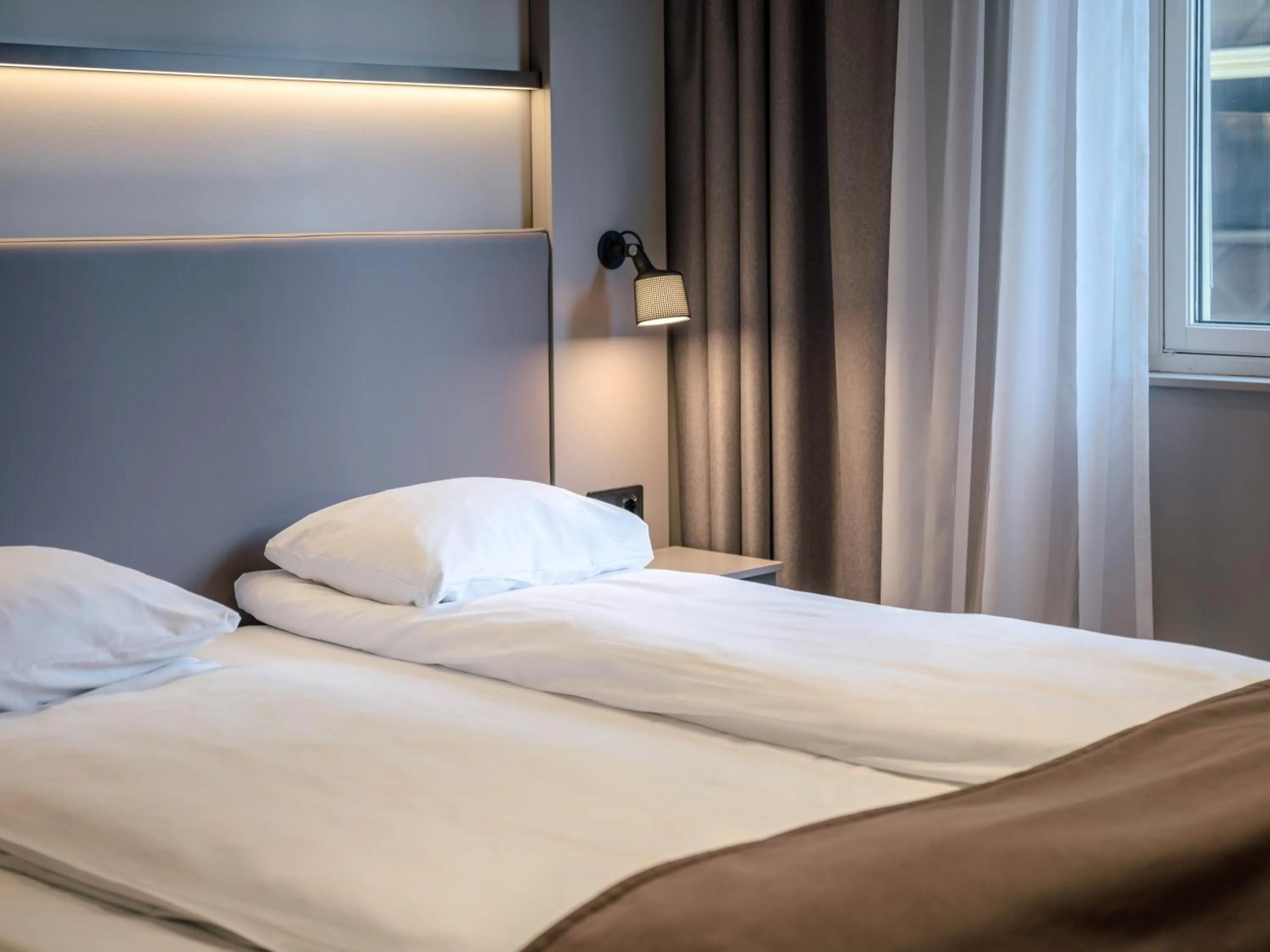 Bed in Quality Hotel Saga