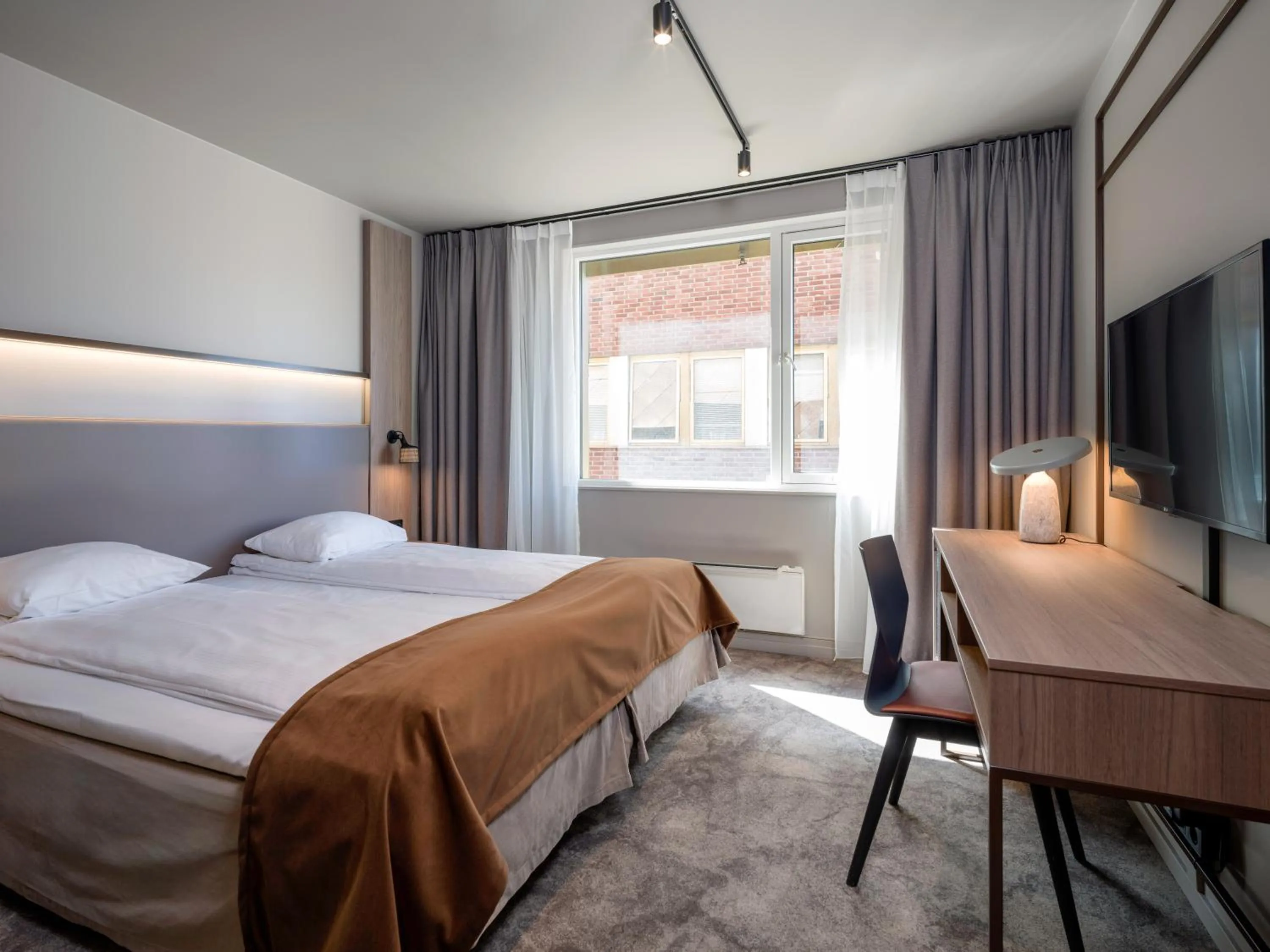 Bed in Quality Hotel Saga