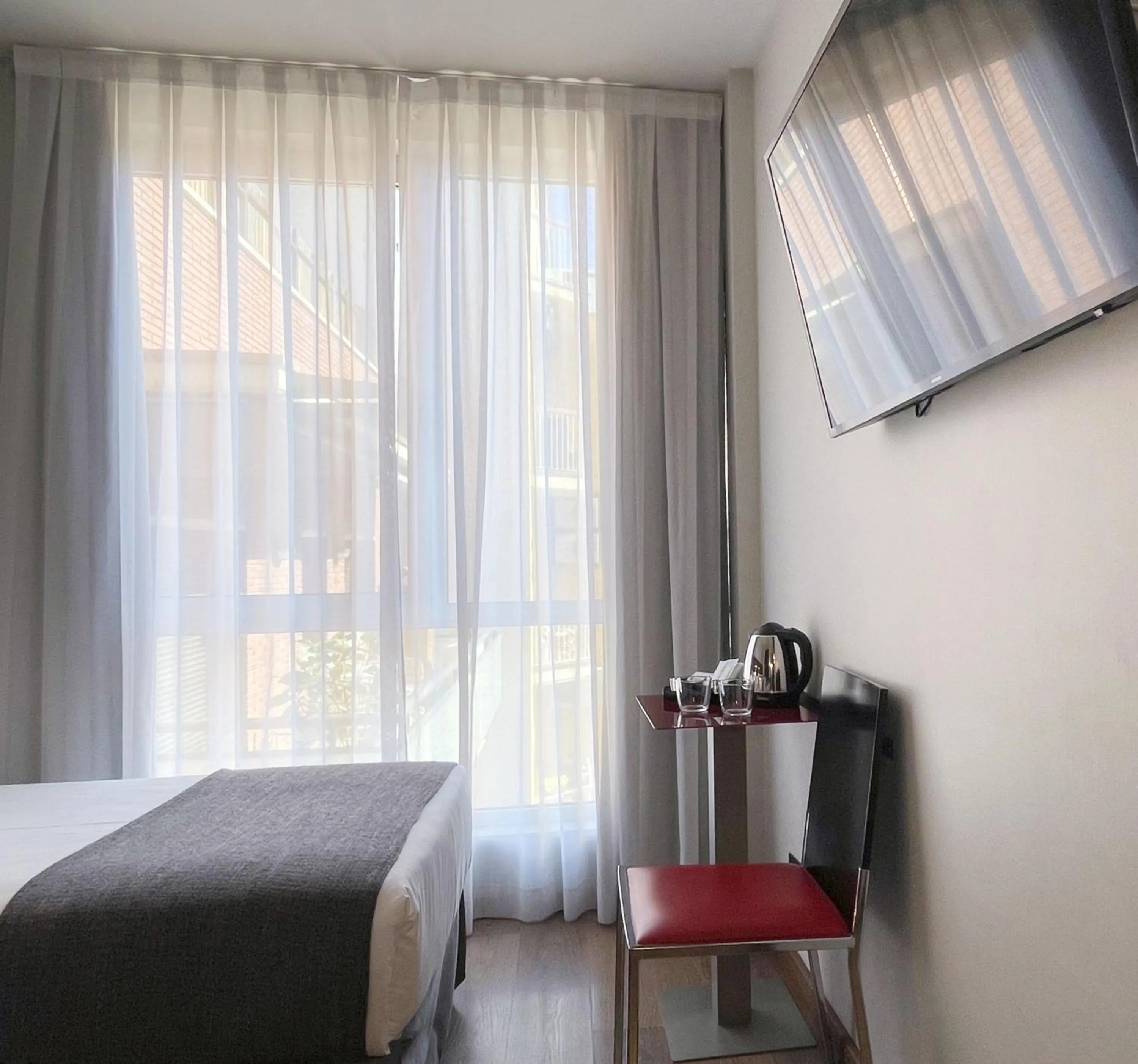 TV and multimedia, Bed in SM Hotel Sant Antoni