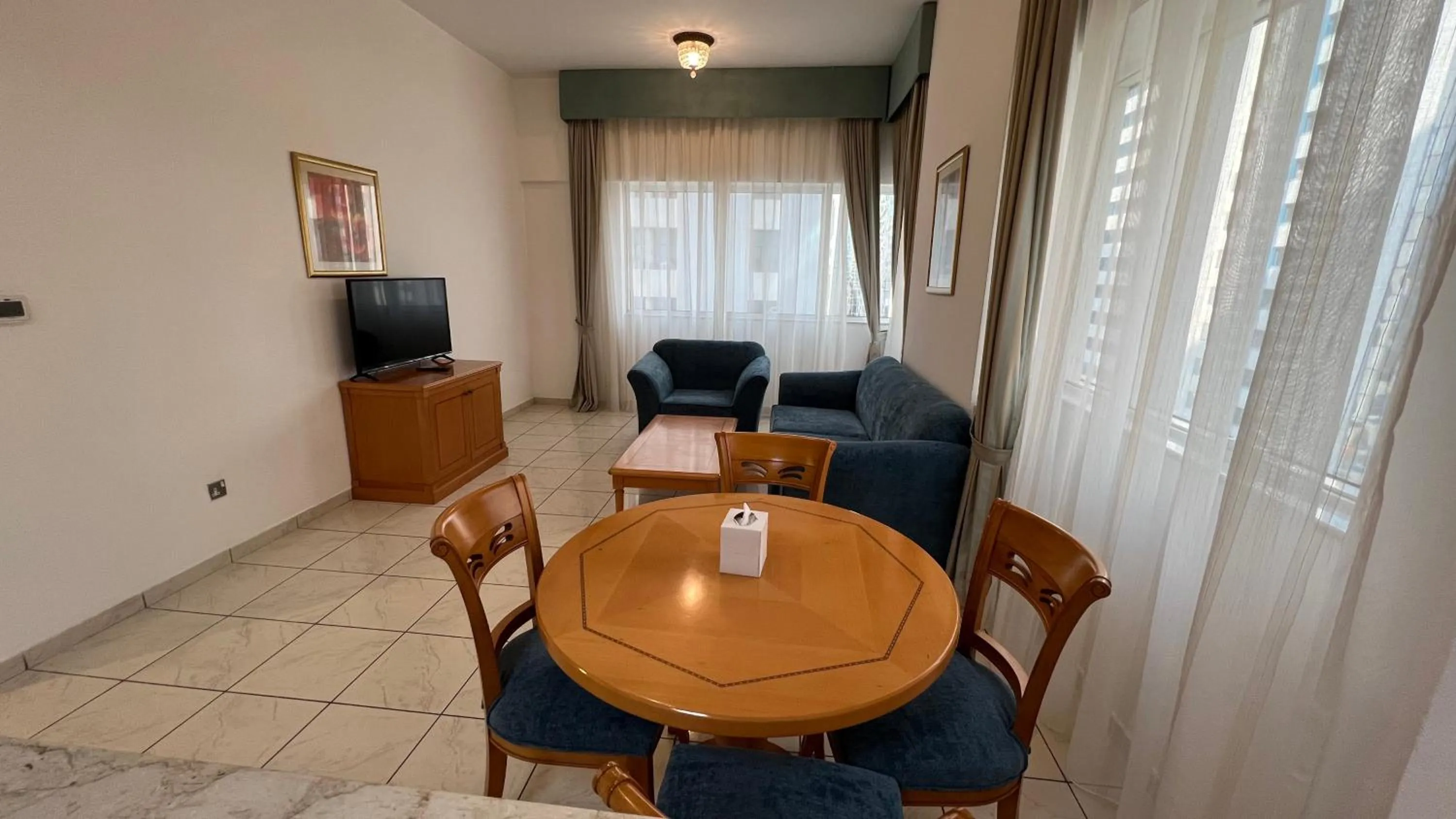 Living room in Uptown Hotel Apartments Abu Dhabi by Gewan