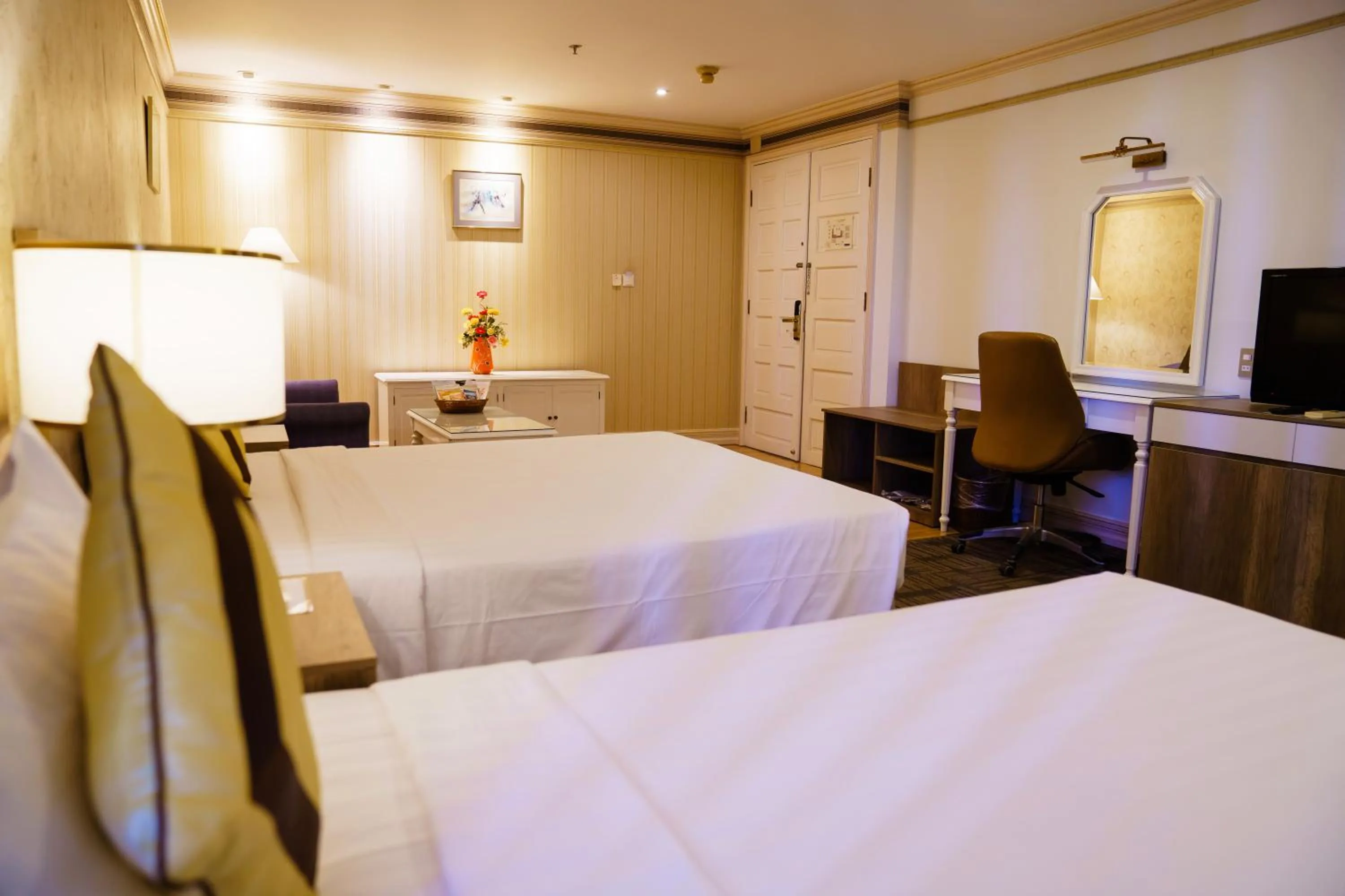 Bed in Lotus Saigon Hotel