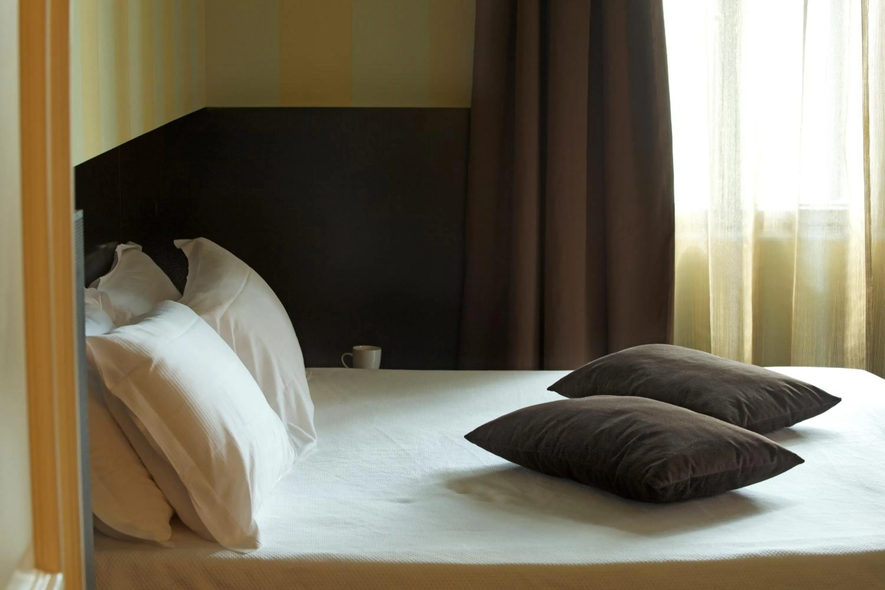 Decorative detail, Bed in Hotel Clocchiatti Next