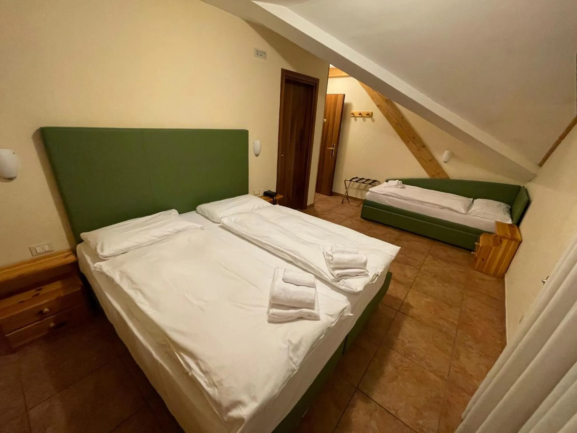 Bed in Hotel Trieste