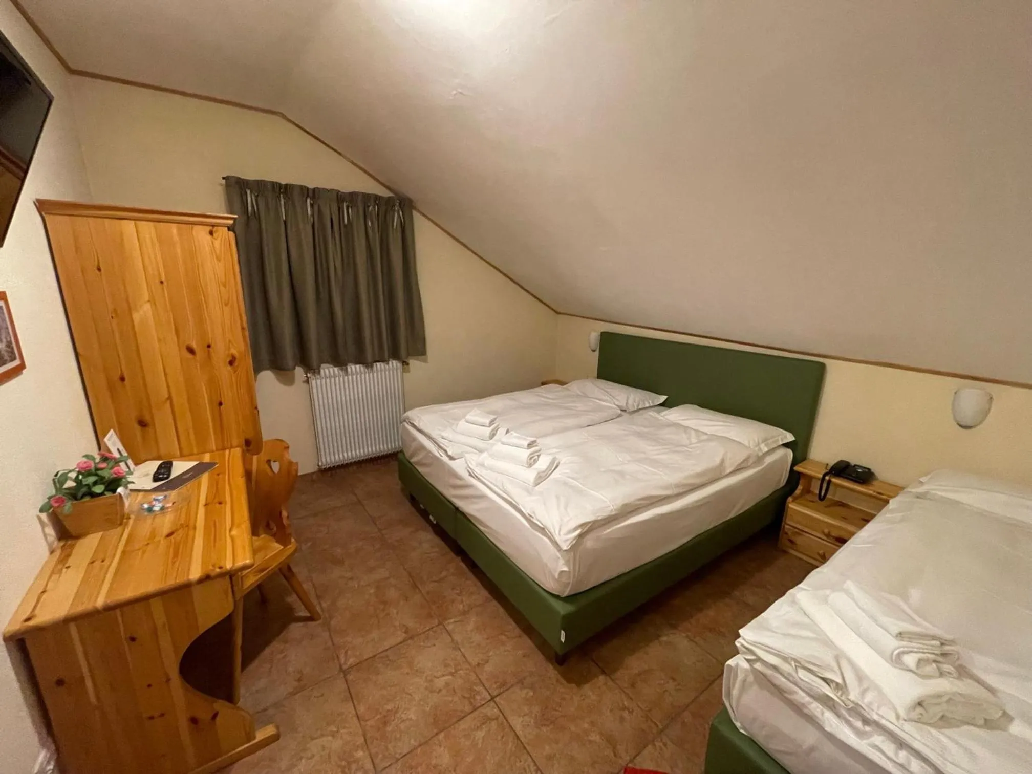 Bed in Hotel Trieste