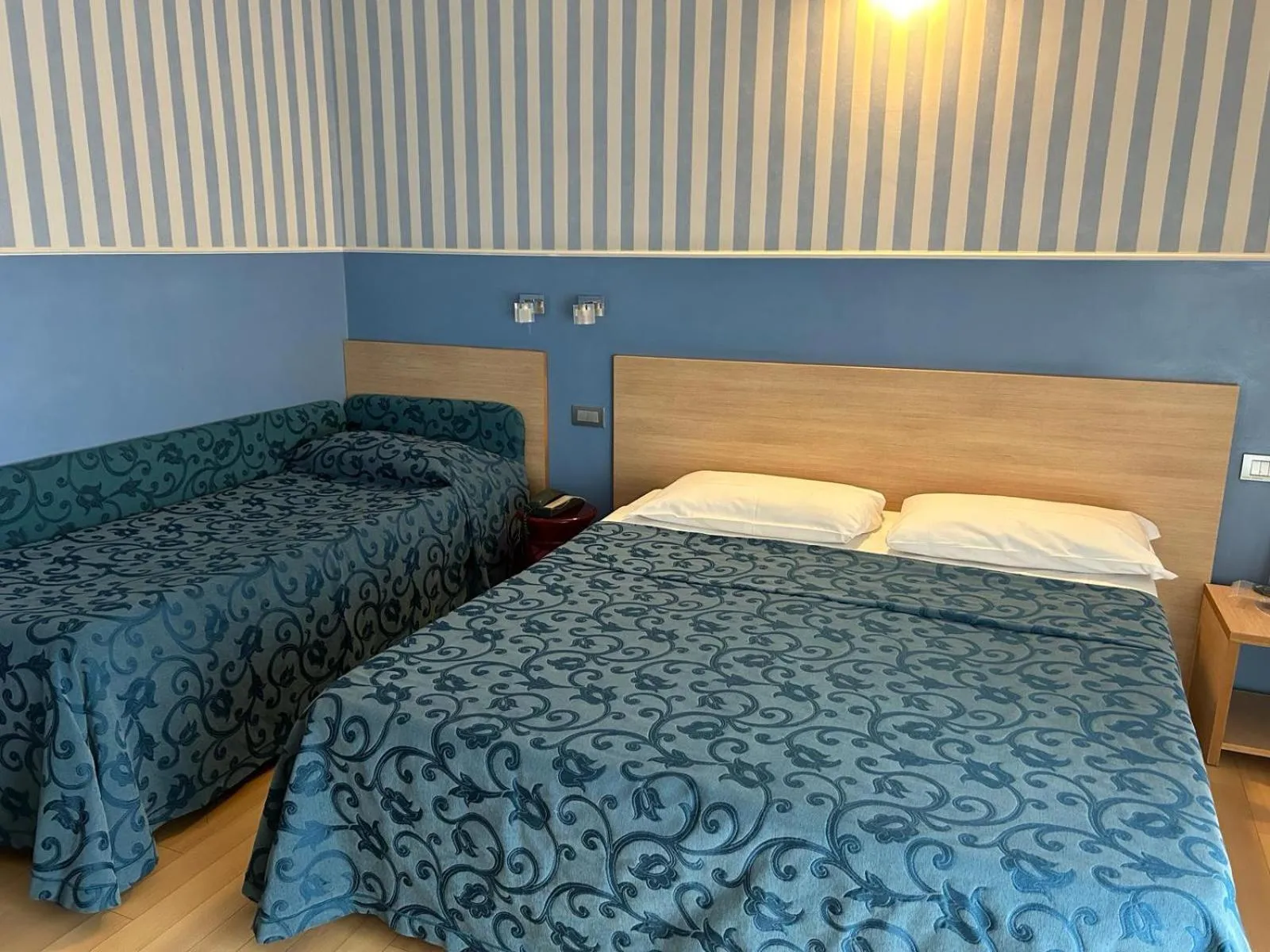 Bedroom in Hotel Perla - The storyhoteller