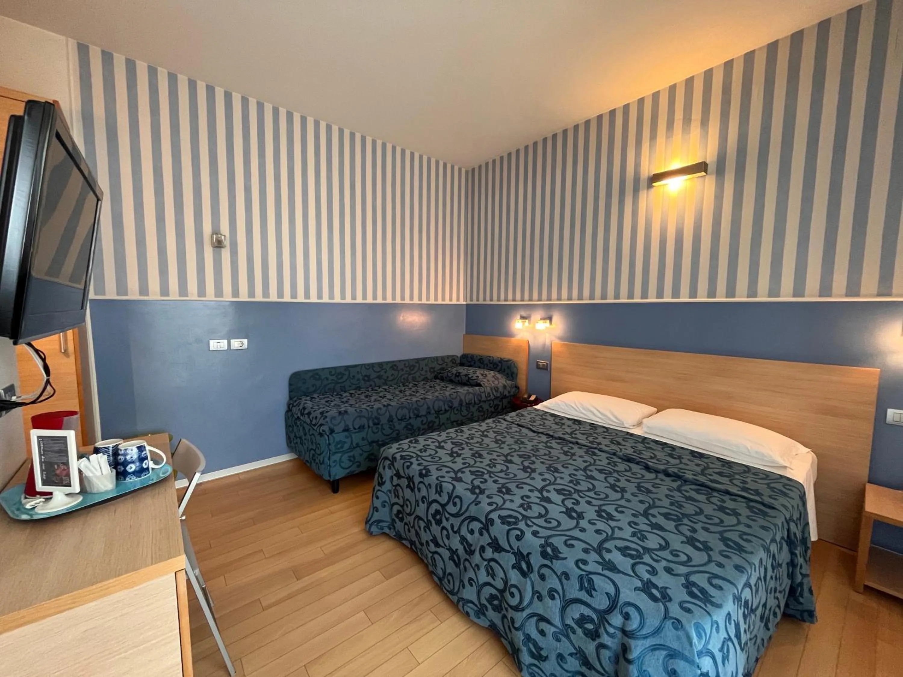 Bed in Hotel Perla - The storyhoteller