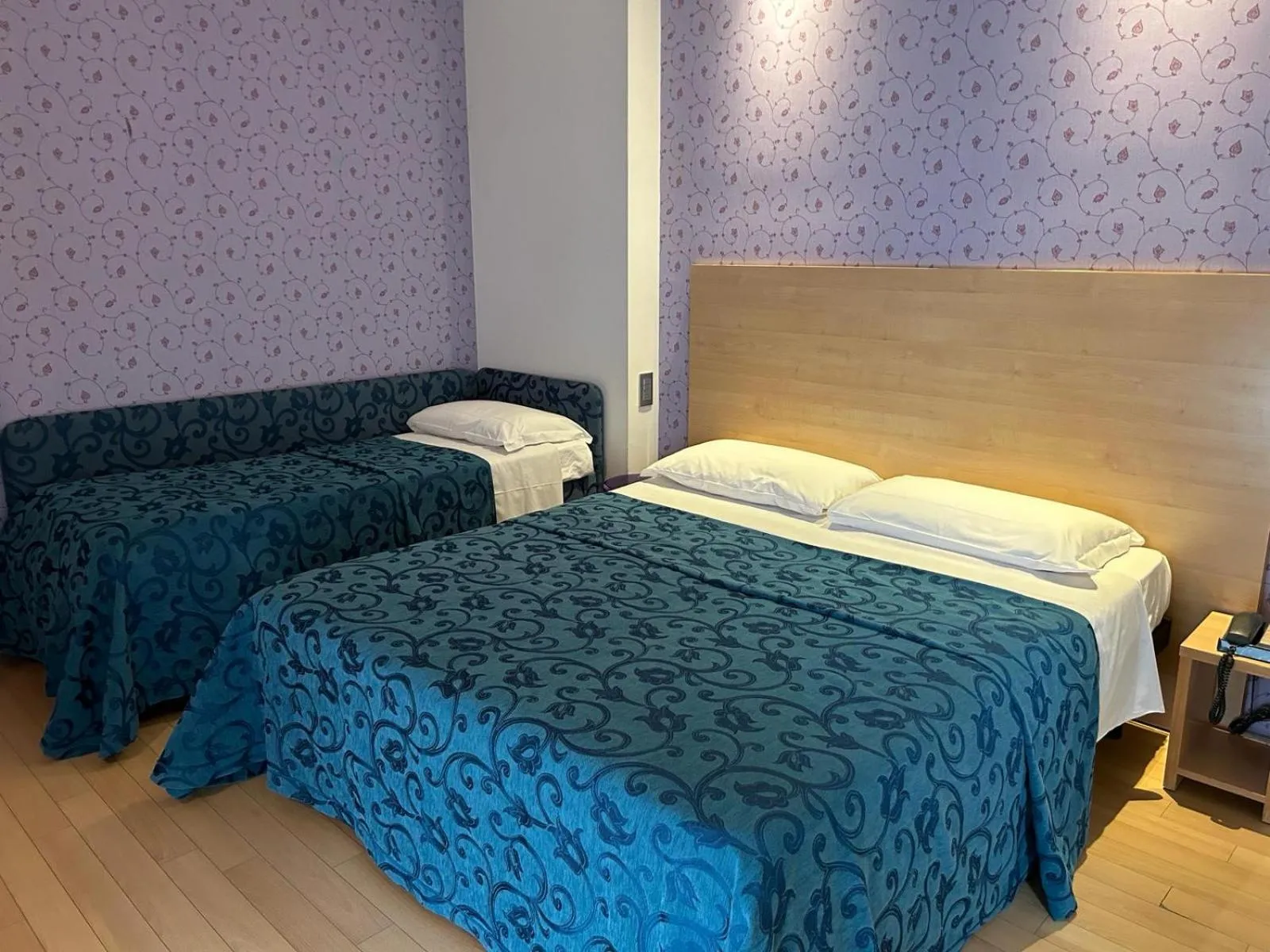 Bedroom in Hotel Perla - The storyhoteller