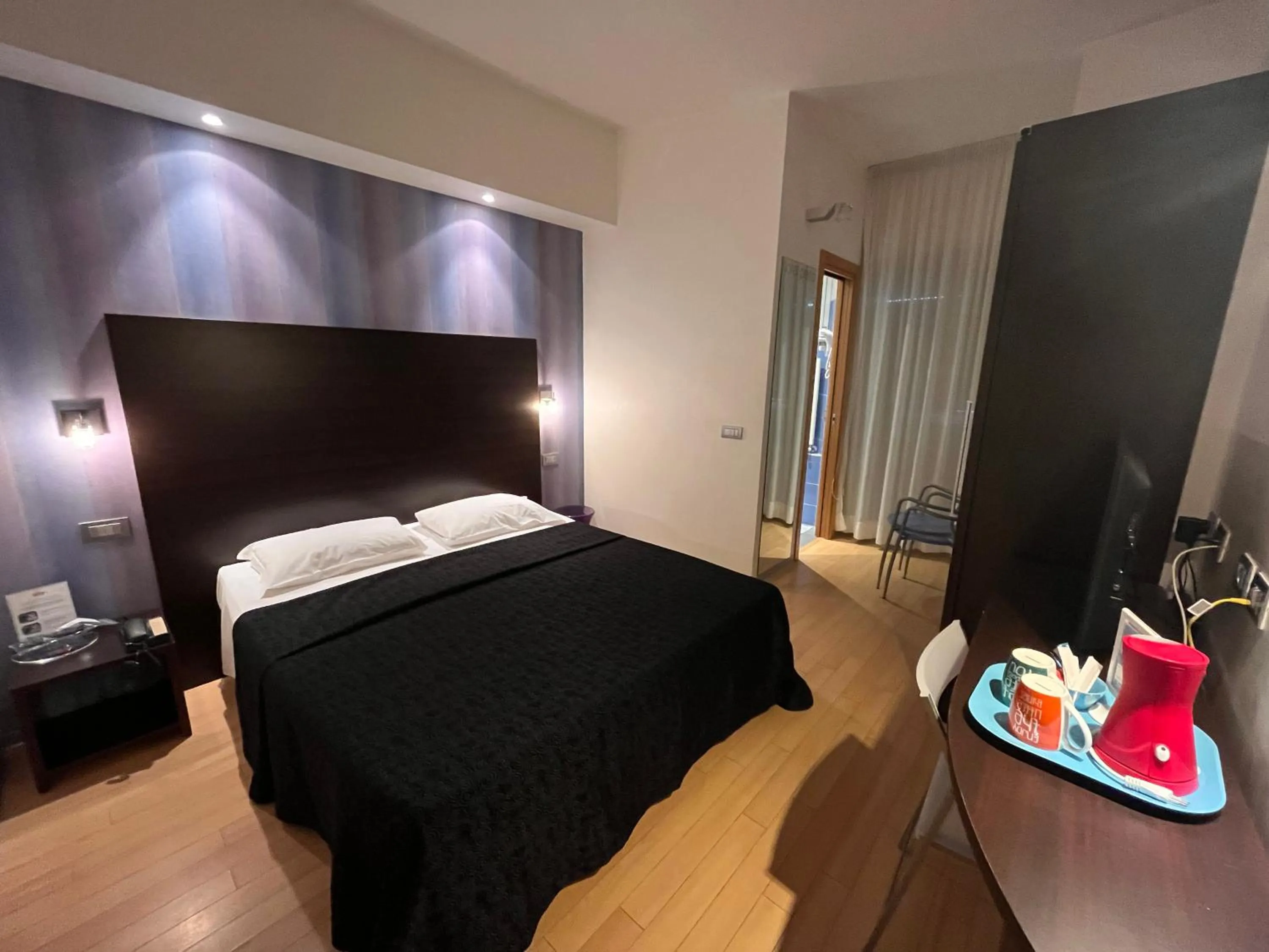 Bed in Hotel Perla - The storyhoteller