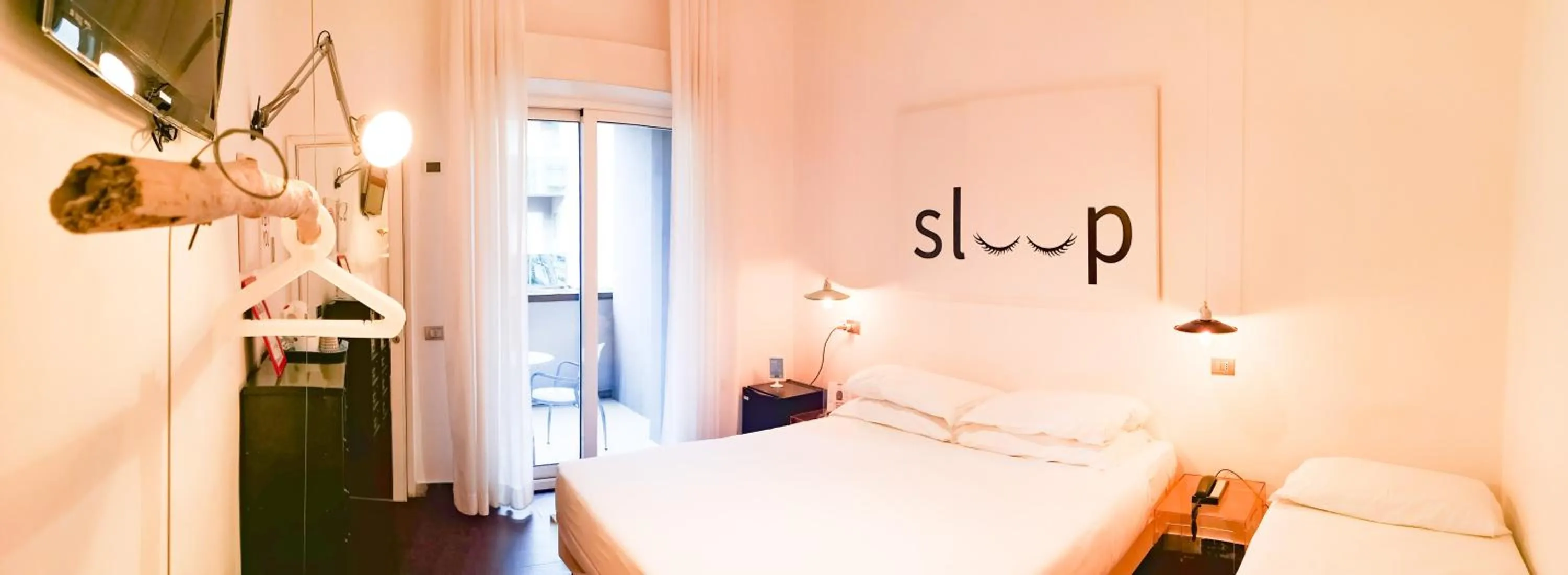 Bed in Hotel Perla - The storyhoteller