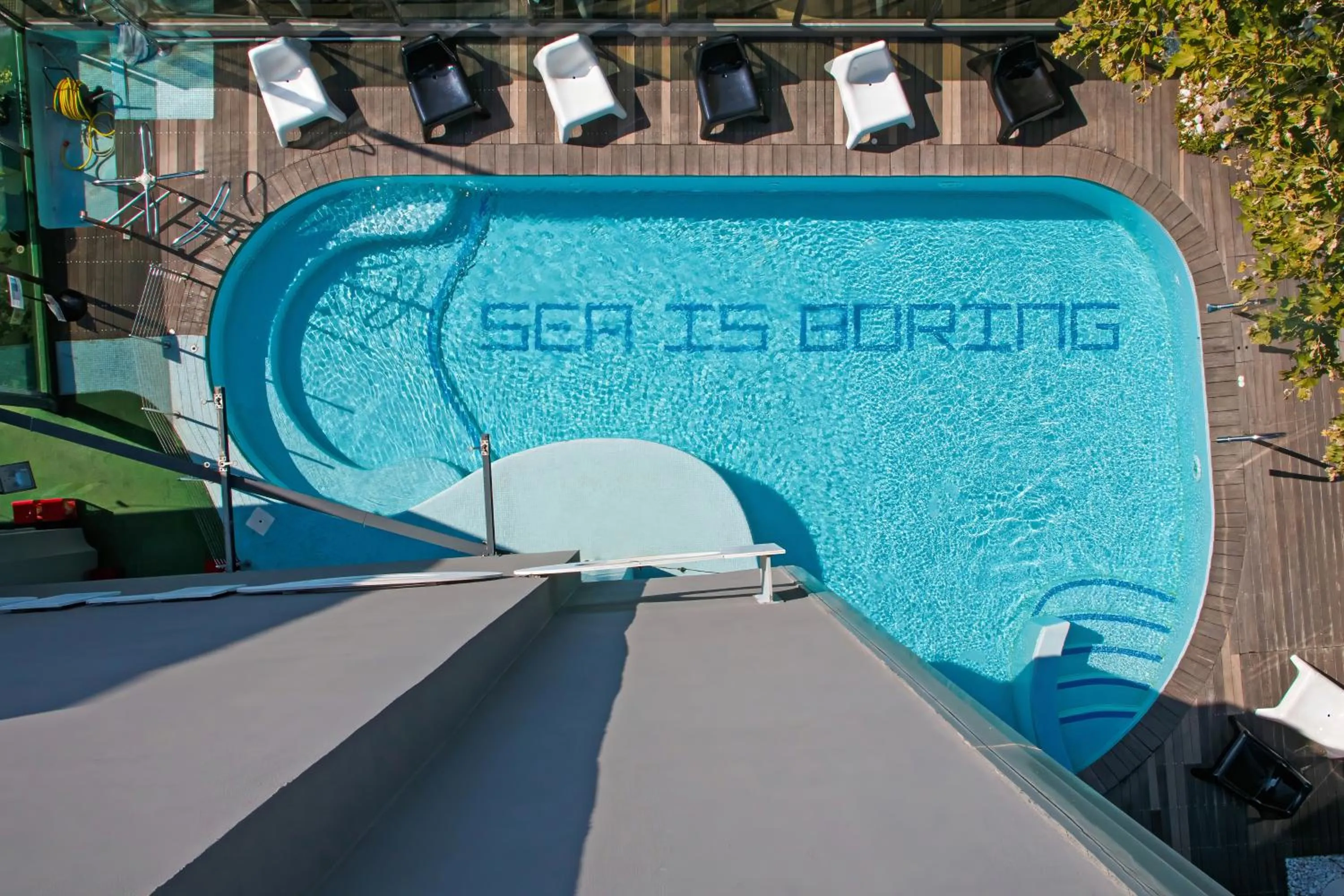 Pool view in Hotel Perla - The storyhoteller