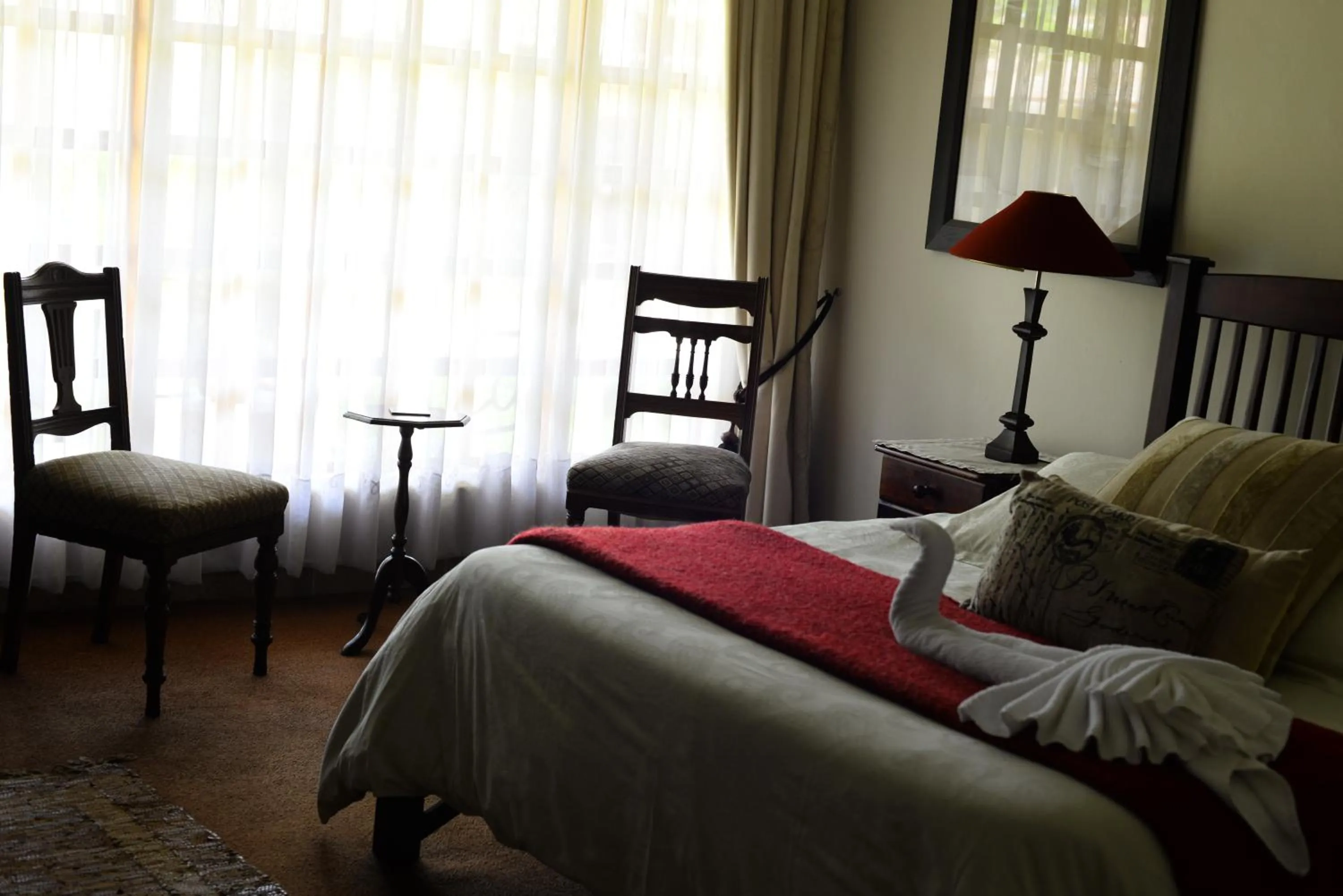 Seating area, Bed in Avant Garde Lodge