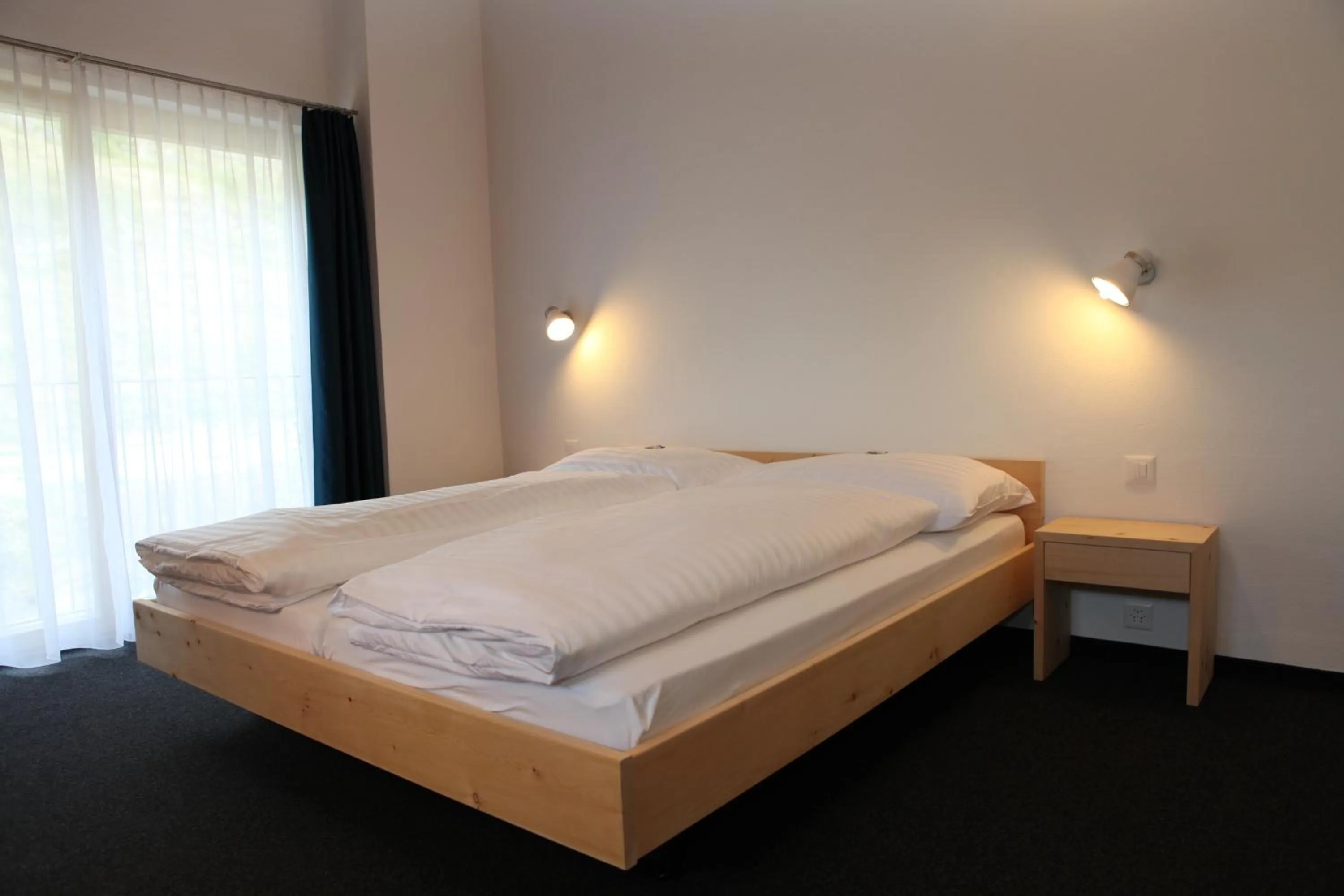 Photo of the whole room, Bed in Schorta's Alvetern - Boutique Hotel