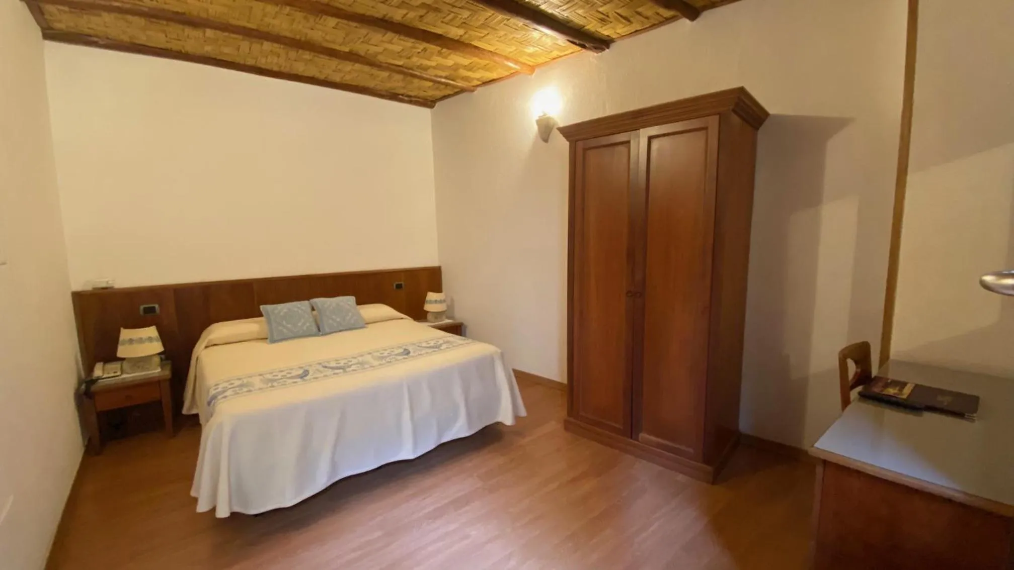 Bed in Hotel Villa Canu