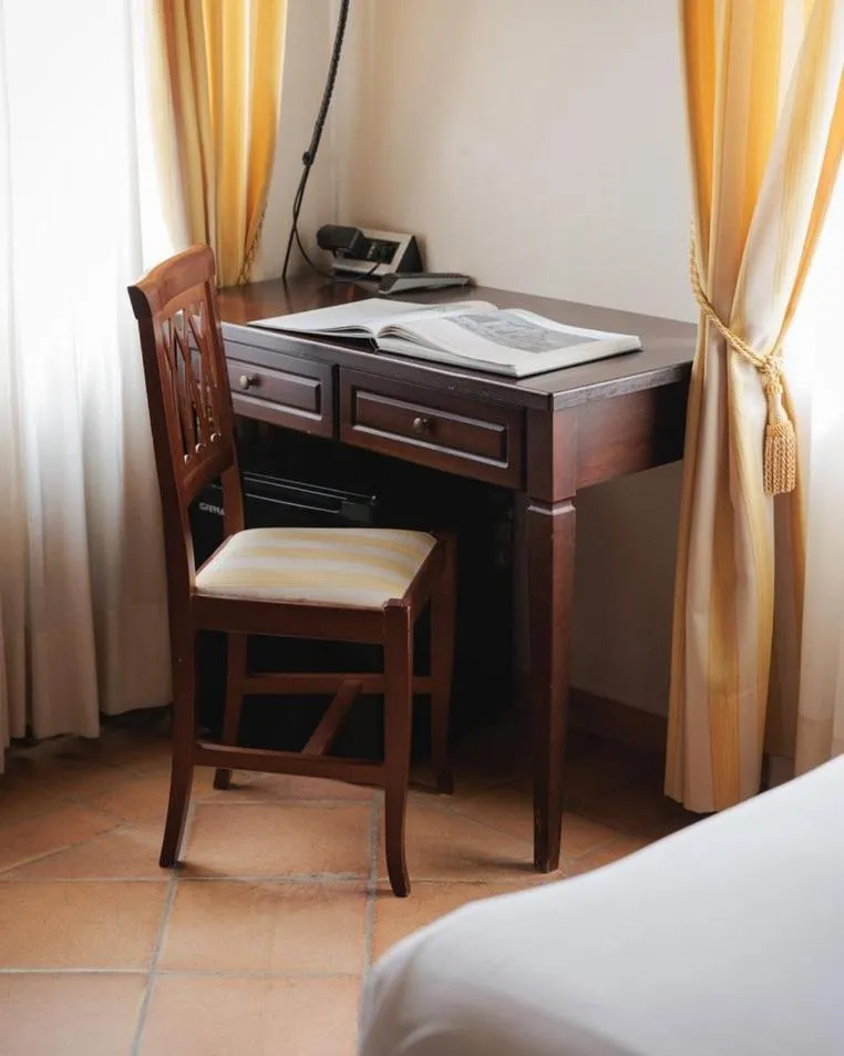 Bed in Hotel San Claudio