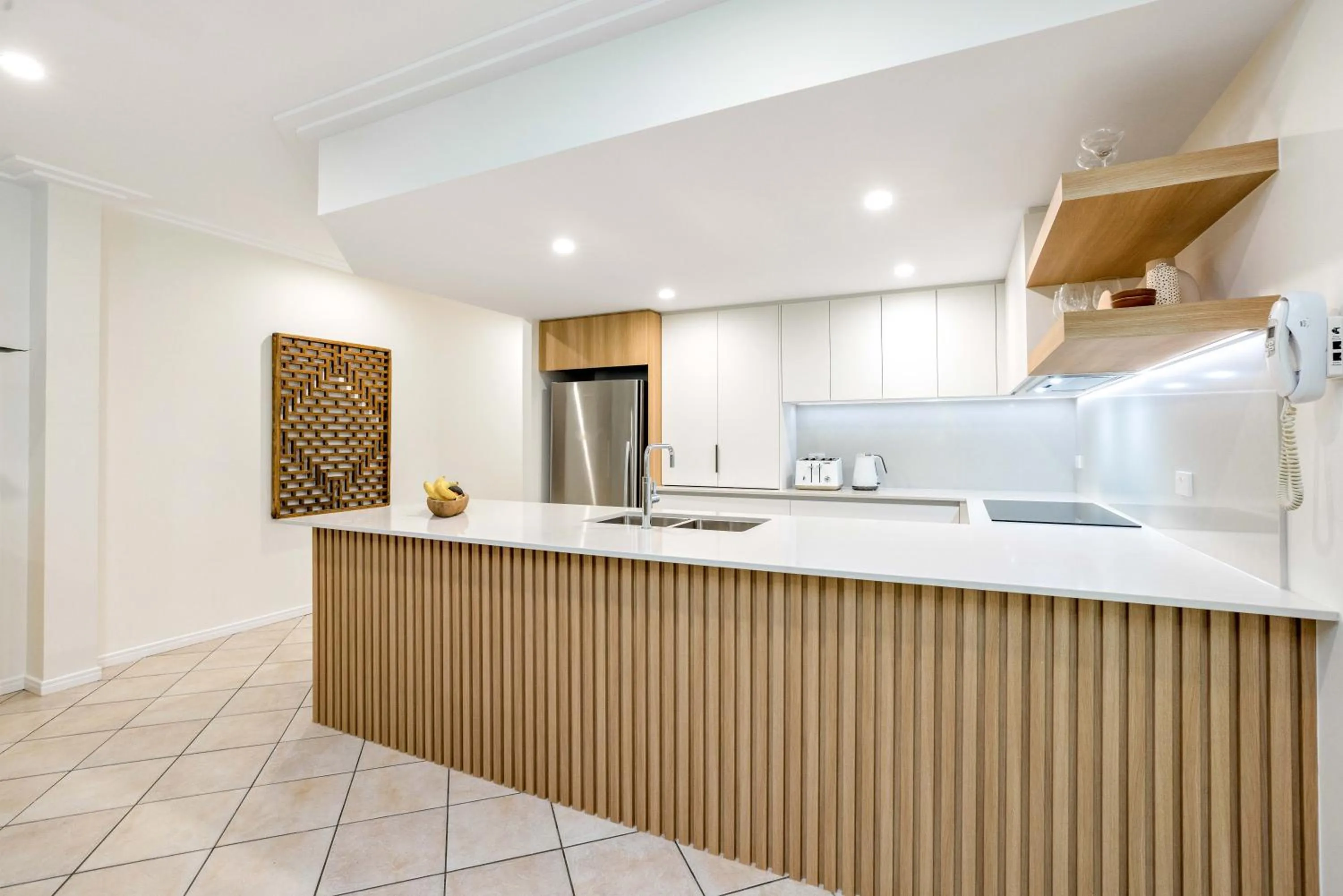 Kitchen or kitchenette in Oasis at Palm Cove