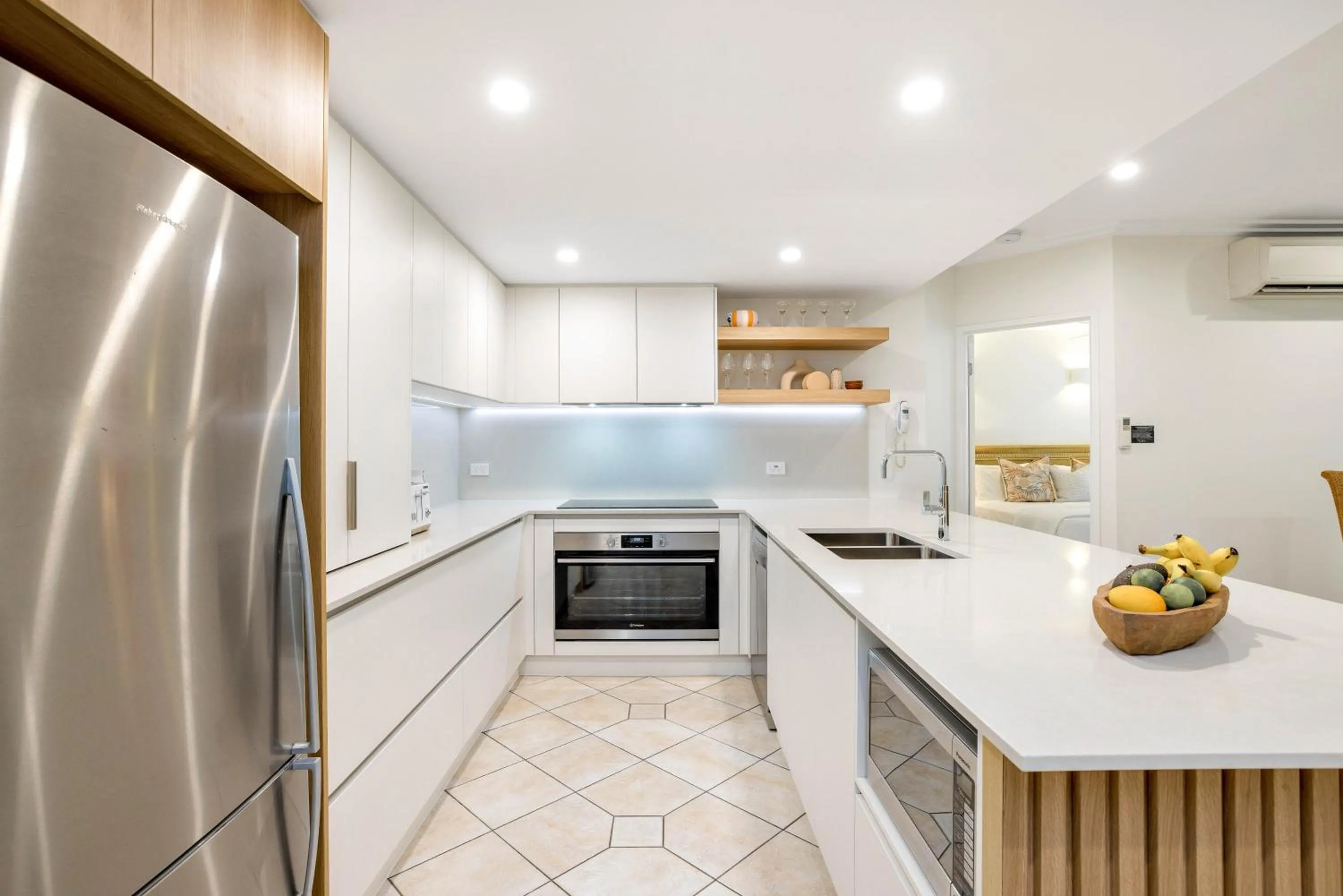 Kitchen or kitchenette in Oasis at Palm Cove