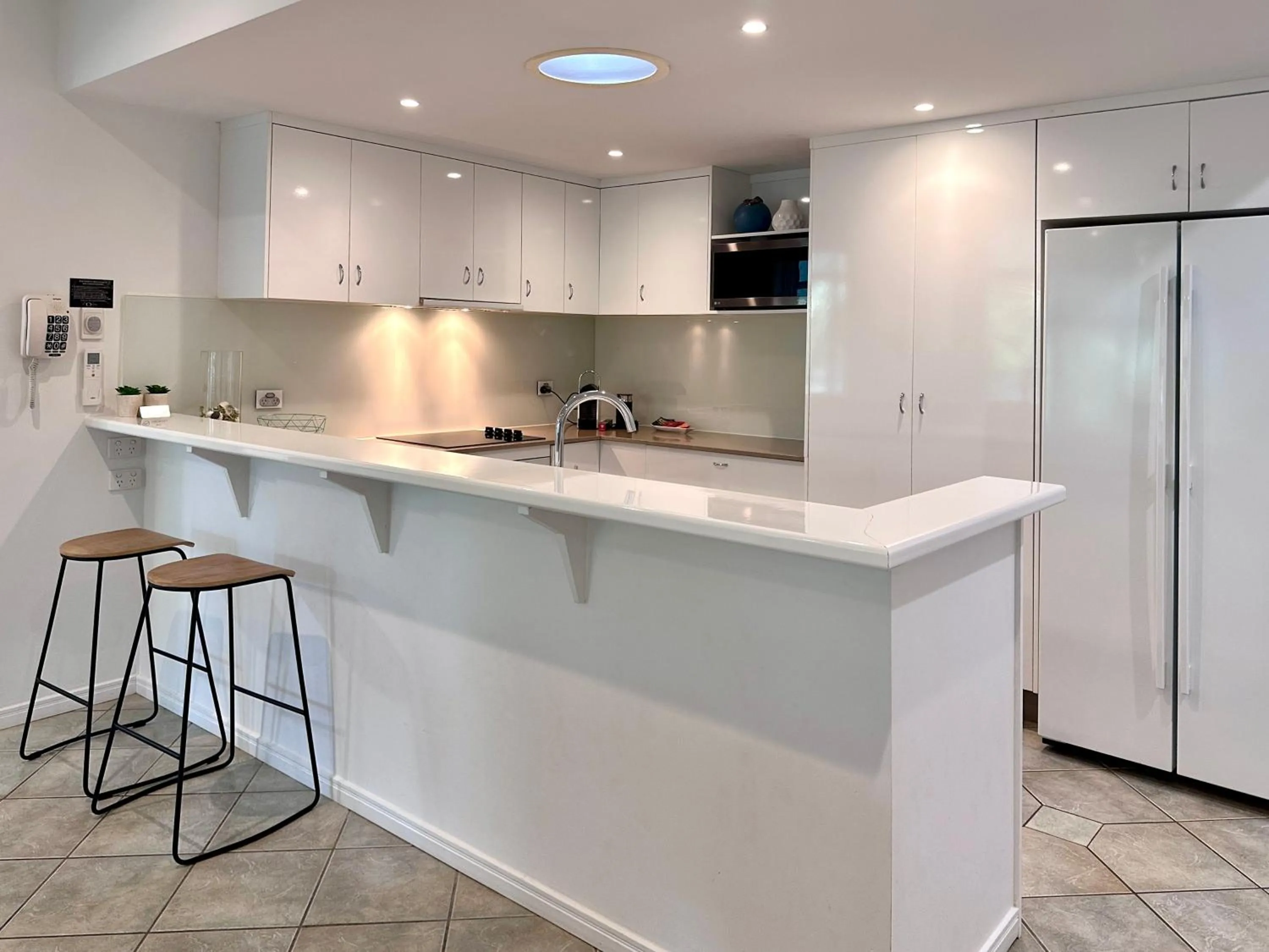 Kitchen or kitchenette in Oasis at Palm Cove