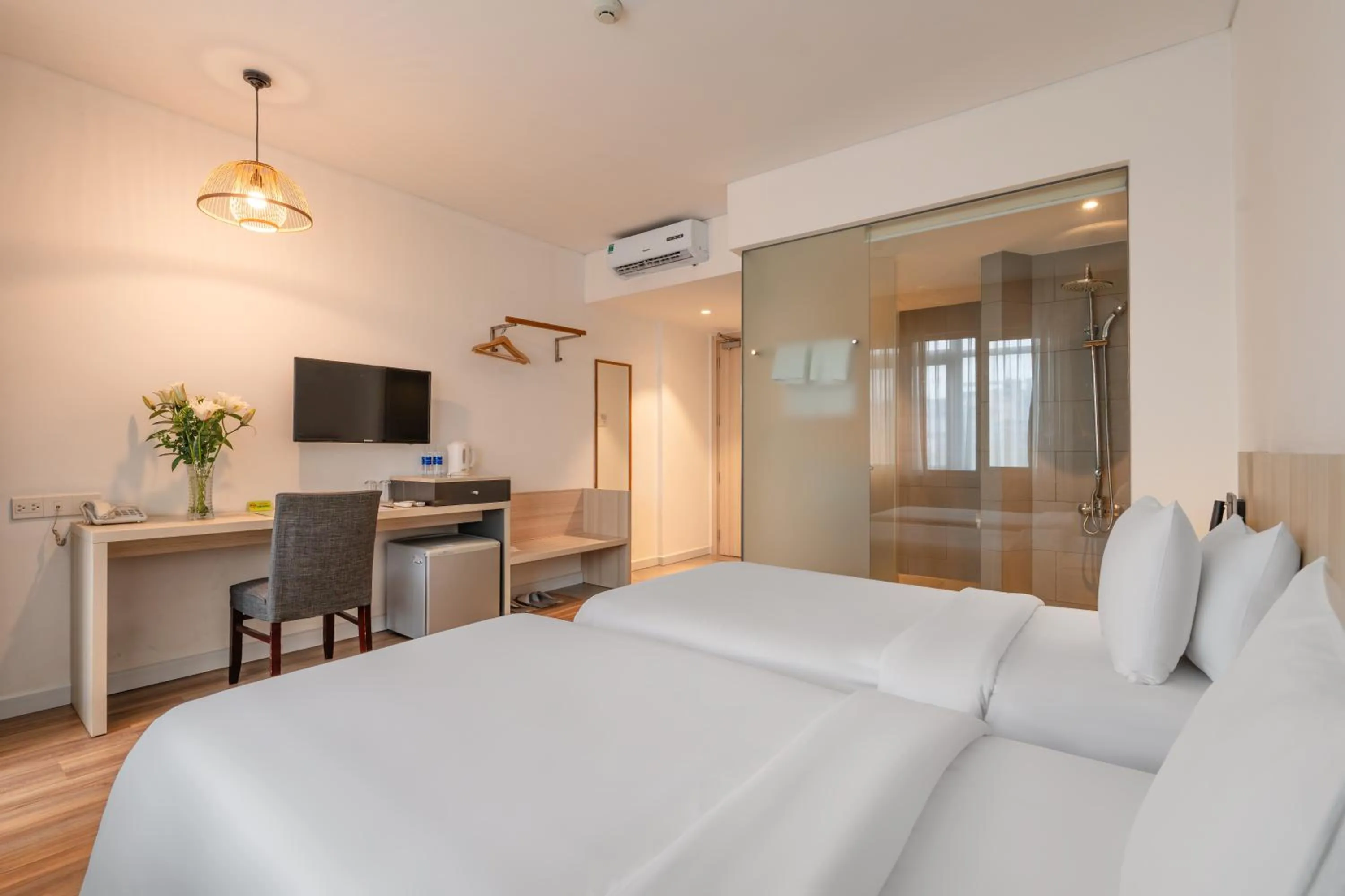 Bed in Liberty Hotel Saigon Greenview