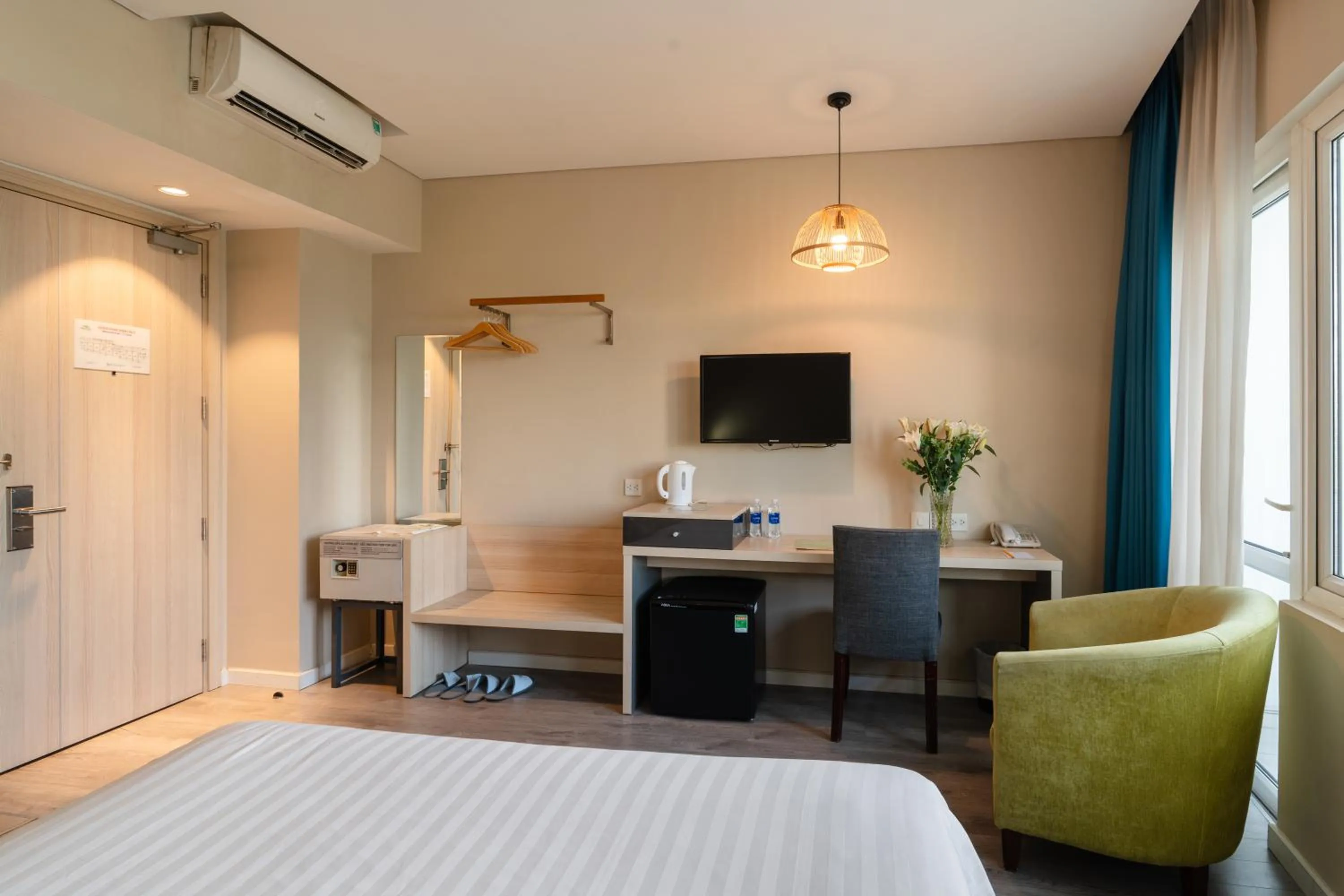 Bed in Liberty Hotel Saigon Greenview