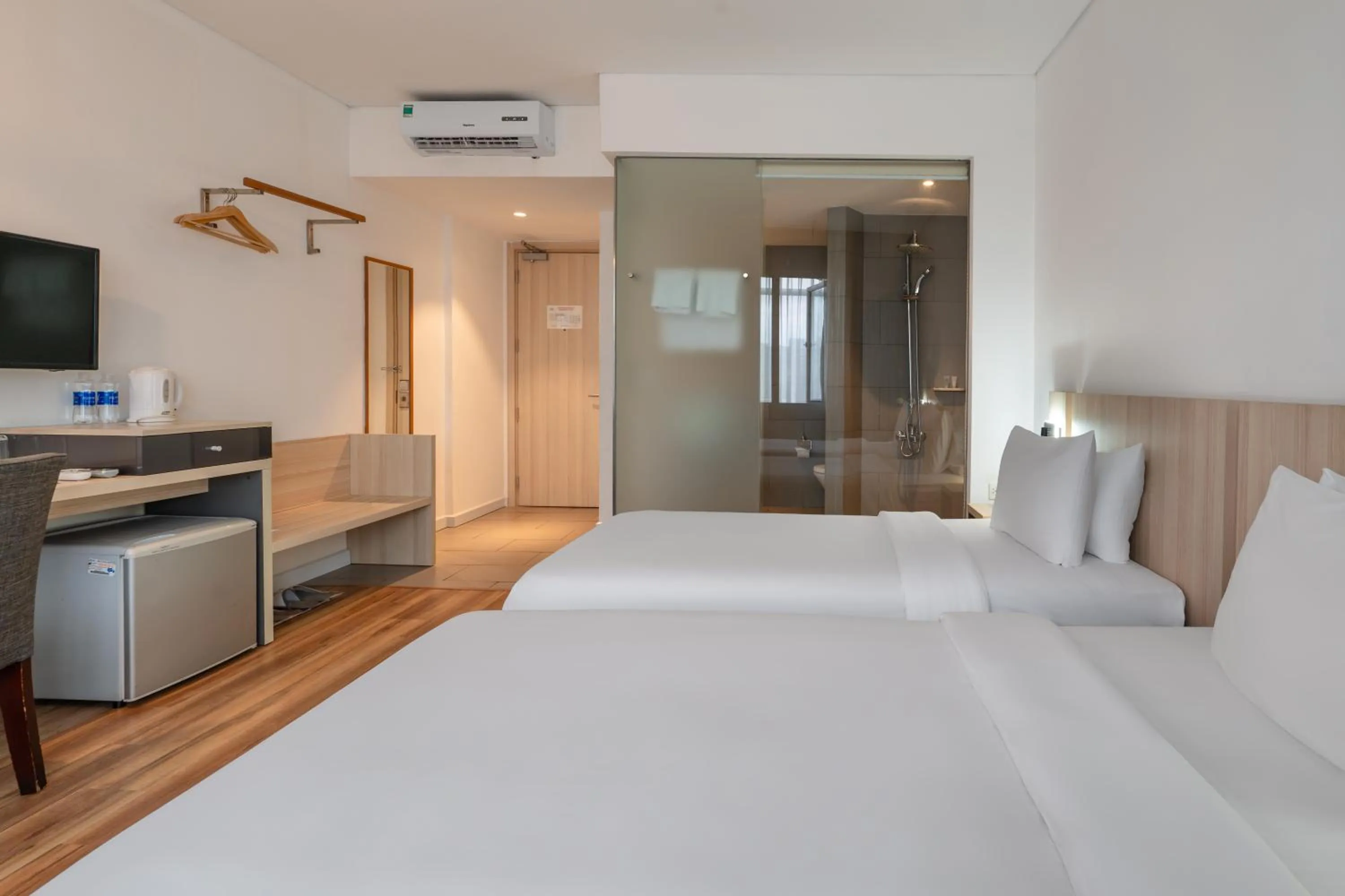 Bed in Liberty Hotel Saigon Greenview