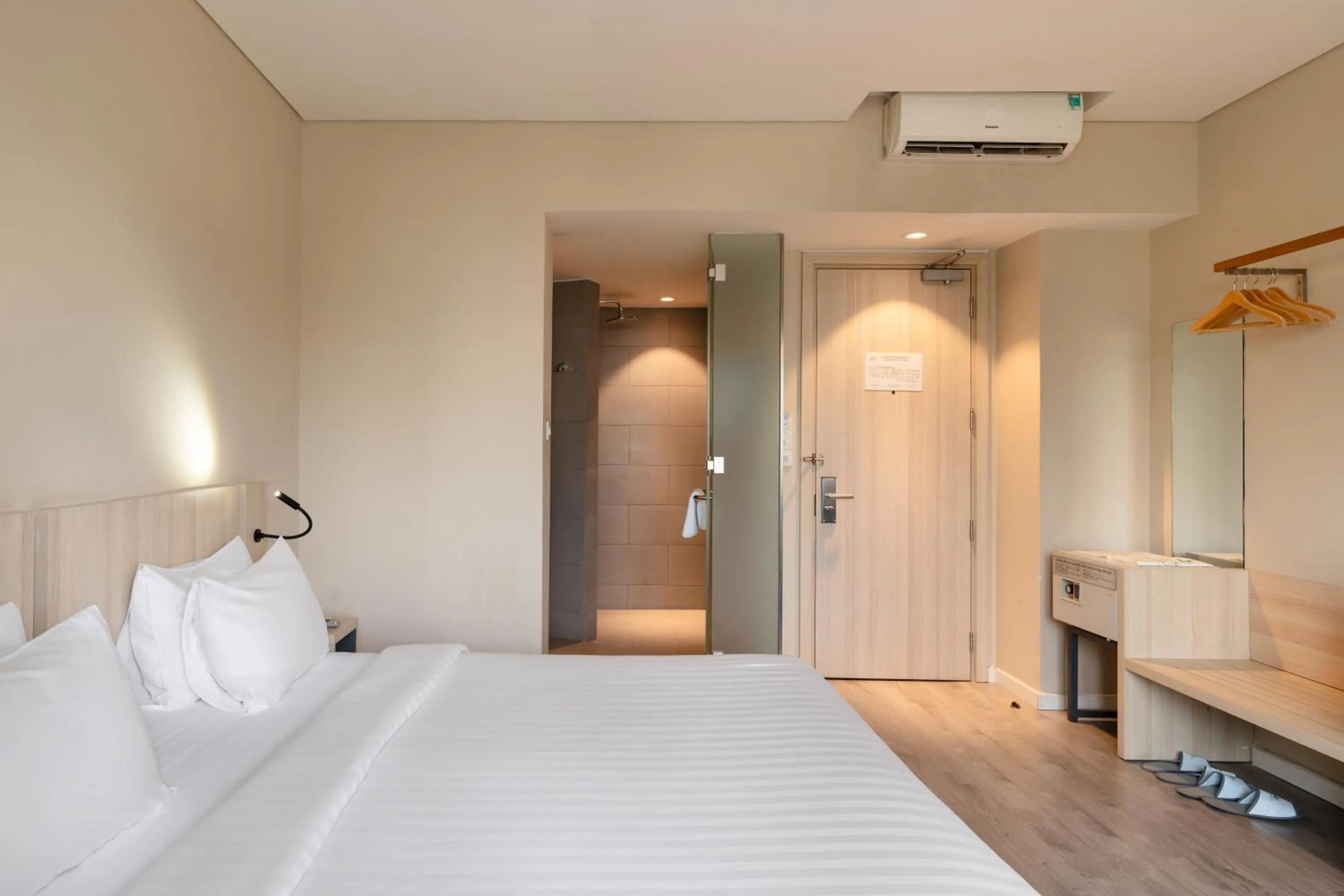 Bed in Liberty Hotel Saigon Greenview