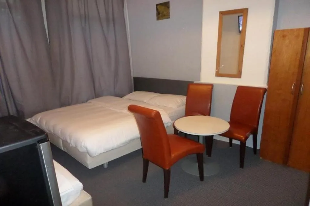 Bed in Hotel Schroder