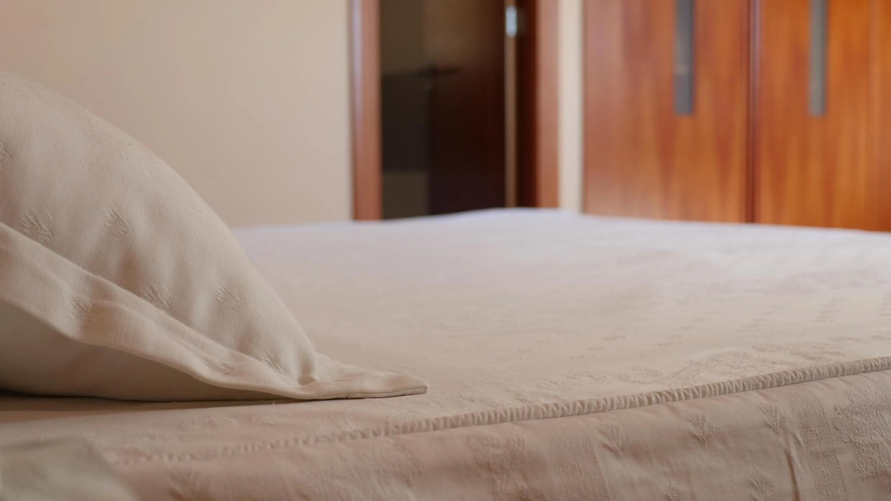 Bed in Hotel Rusadir