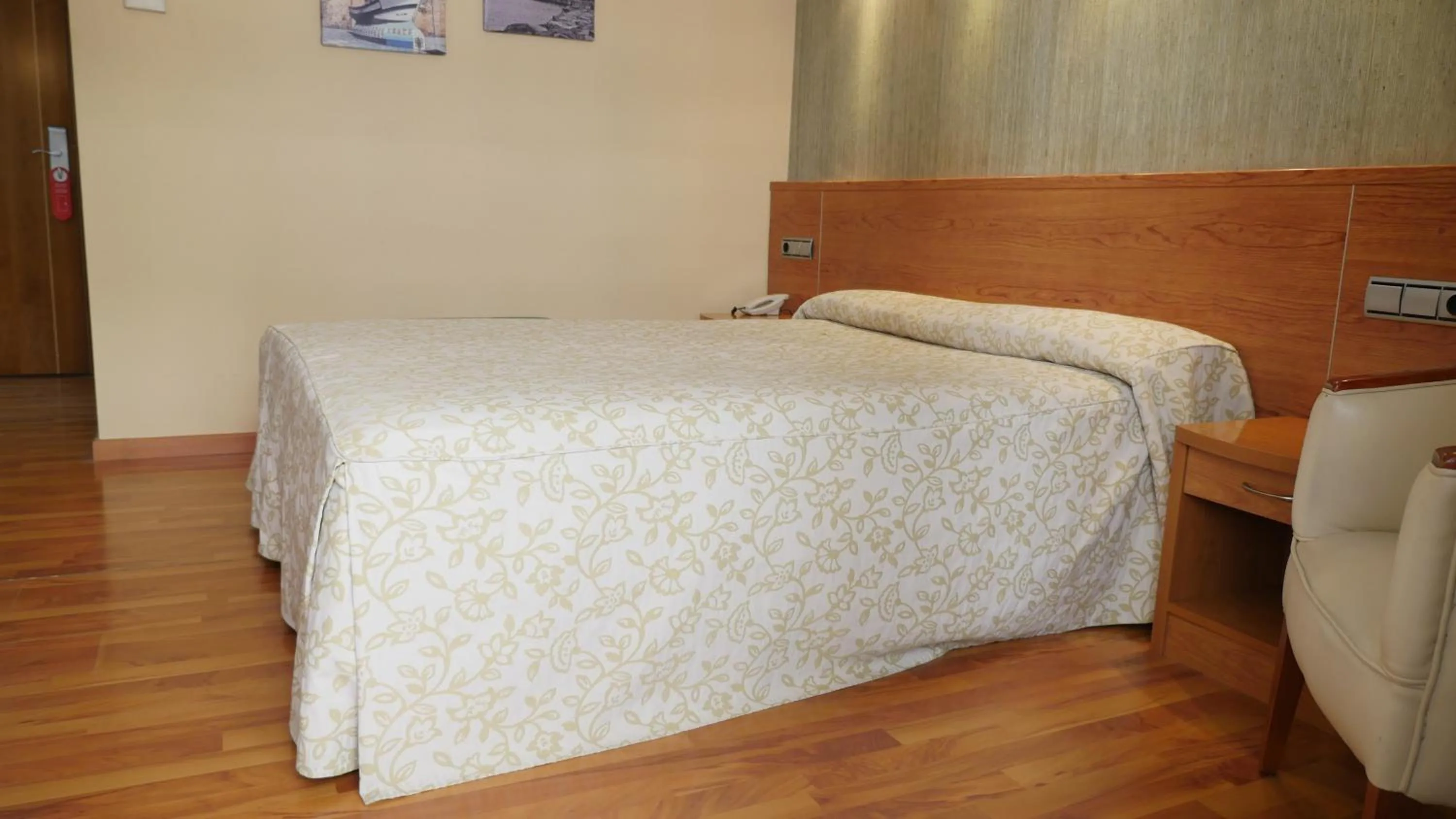 Bed in Hotel Rusadir