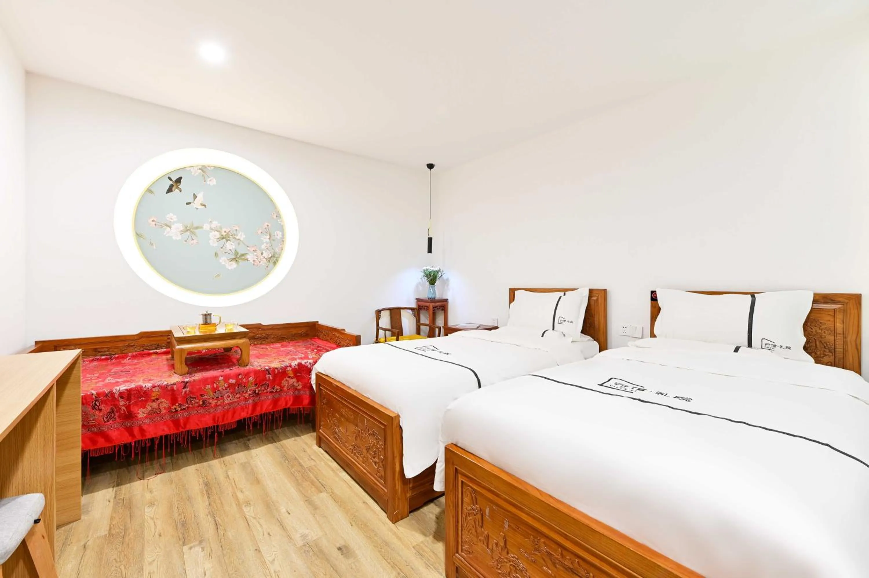 Bed in Xingshe Alley Courtyard Hotel Beijing Wangfujing Forbidden City Branch - Breakfast included & English speaking reception & Free WiFi and Laundry room & Hutong Culture & Cat-keeping & Flower-growing Terrace & One day tour service & Free coffee
