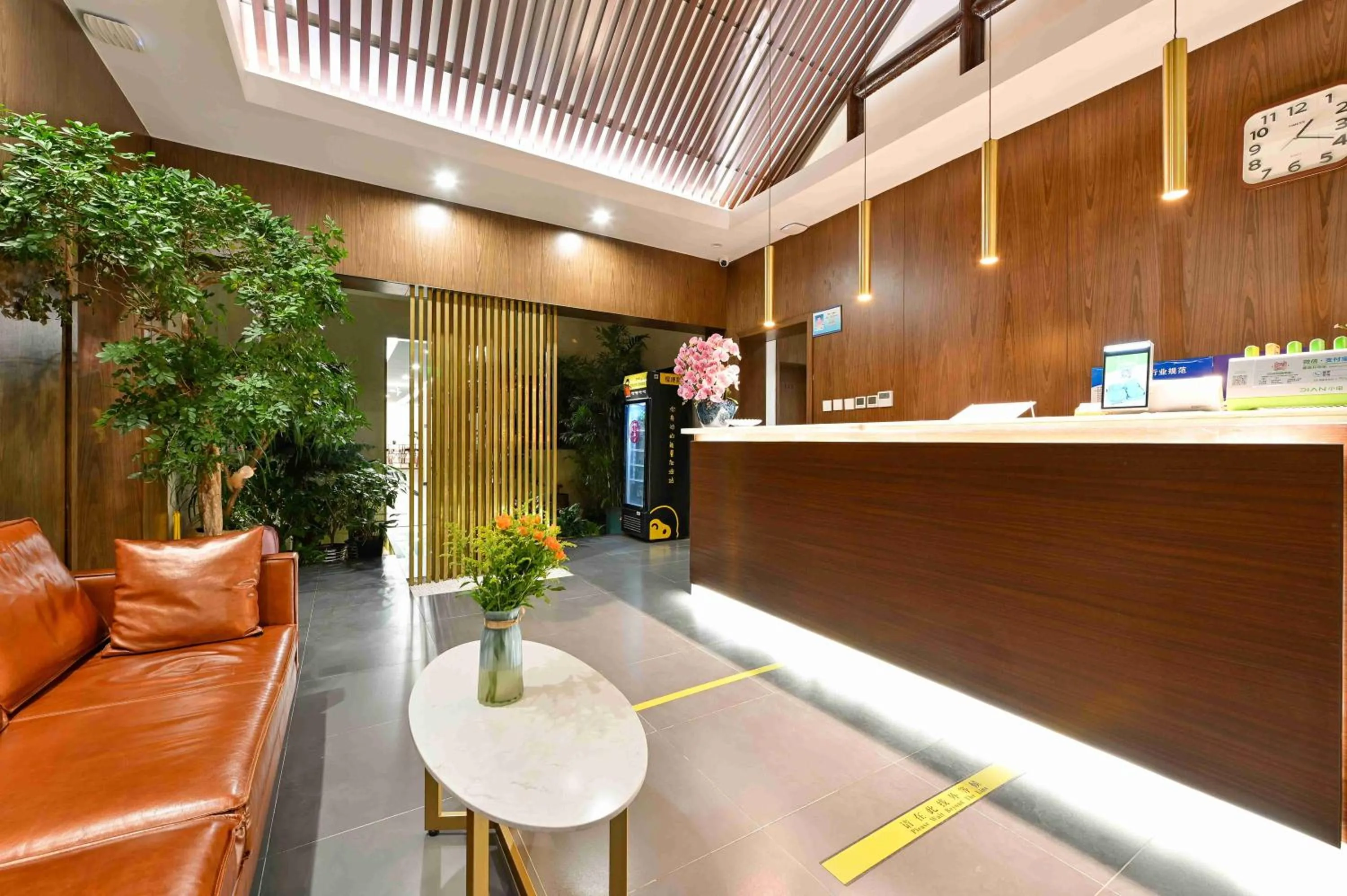 Property logo or sign in Xingshe Alley Courtyard Hotel Beijing Wangfujing Forbidden City Branch - Breakfast included & English speaking reception & Free WiFi and Laundry room & Hutong Culture & Cat-keeping & Flower-growing Terrace & One day tour service & Free coffee