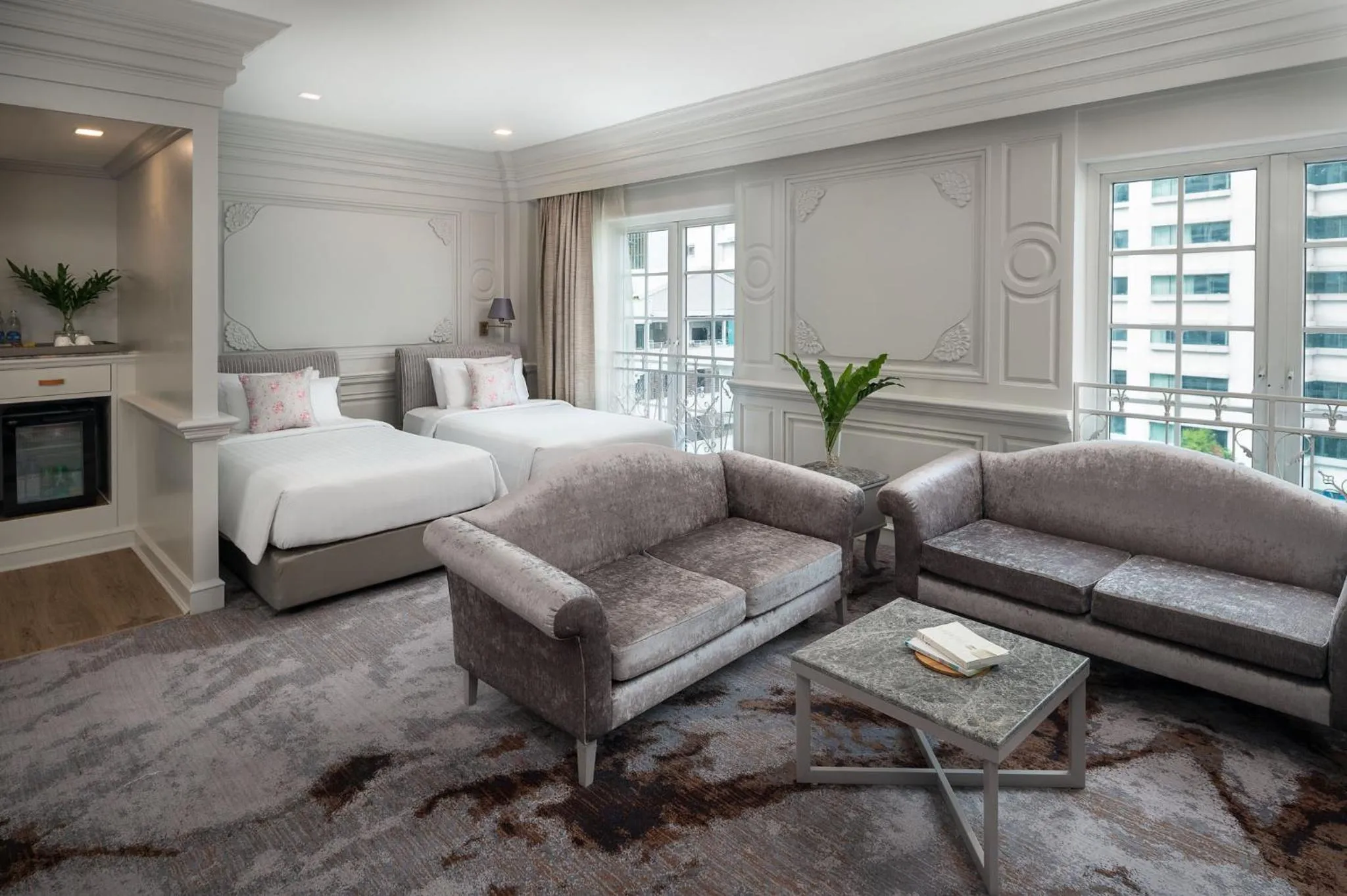 Bed in Kingston Suites Bangkok