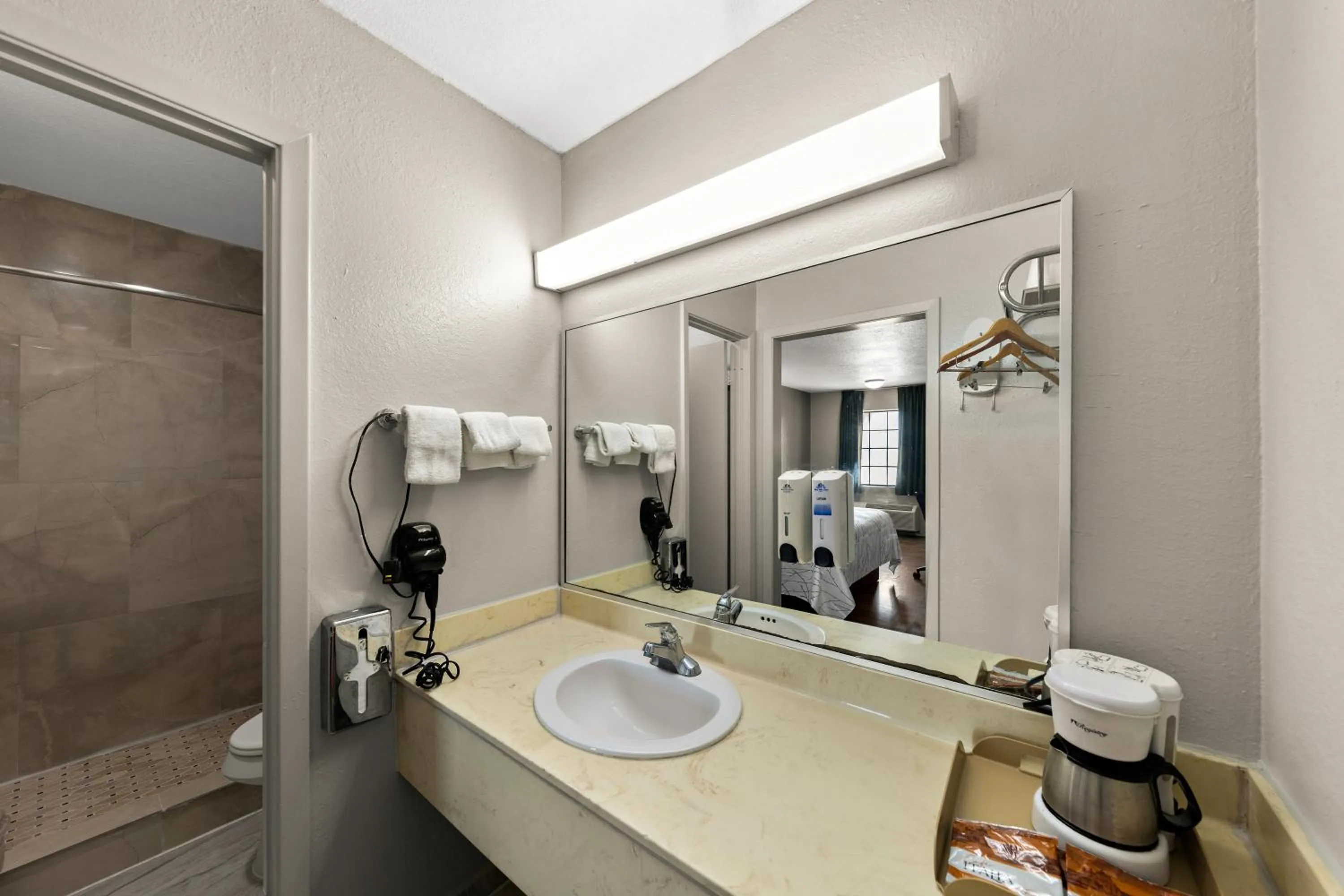 Shower in Americas Best Value Inn Bonham