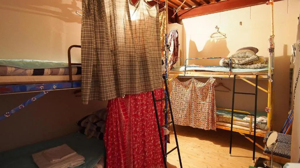 Bed in Kamagasaki University of the Arts Cafe Garden Guest House aka Cocoroom