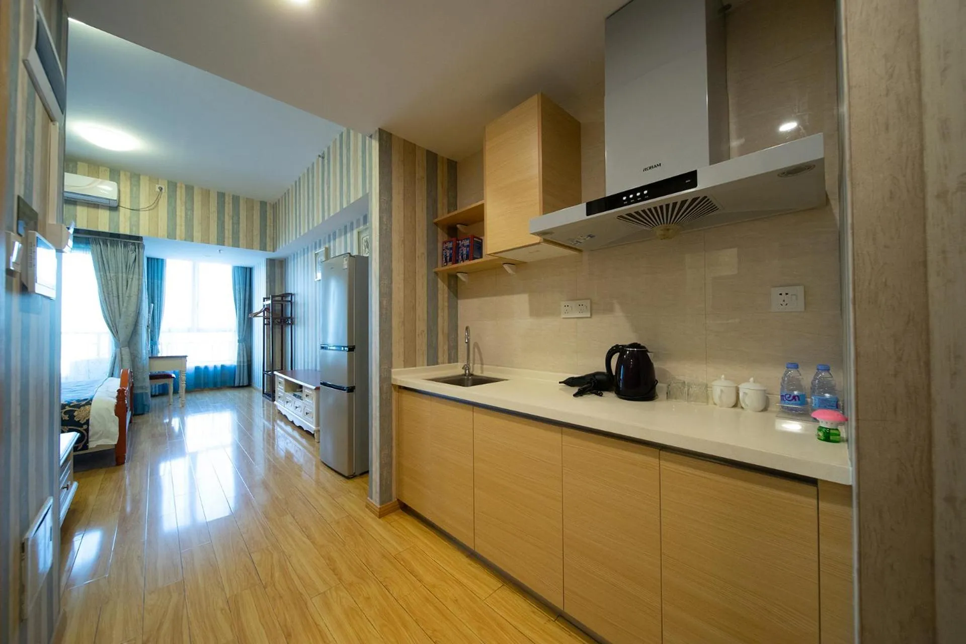 Kitchen or kitchenette in Guangzhou Laiste ApartHotel Science City Greenland Central Plaza Branch - Free Shuttle Bus to Canton Fair Complex During Canton Fair Period