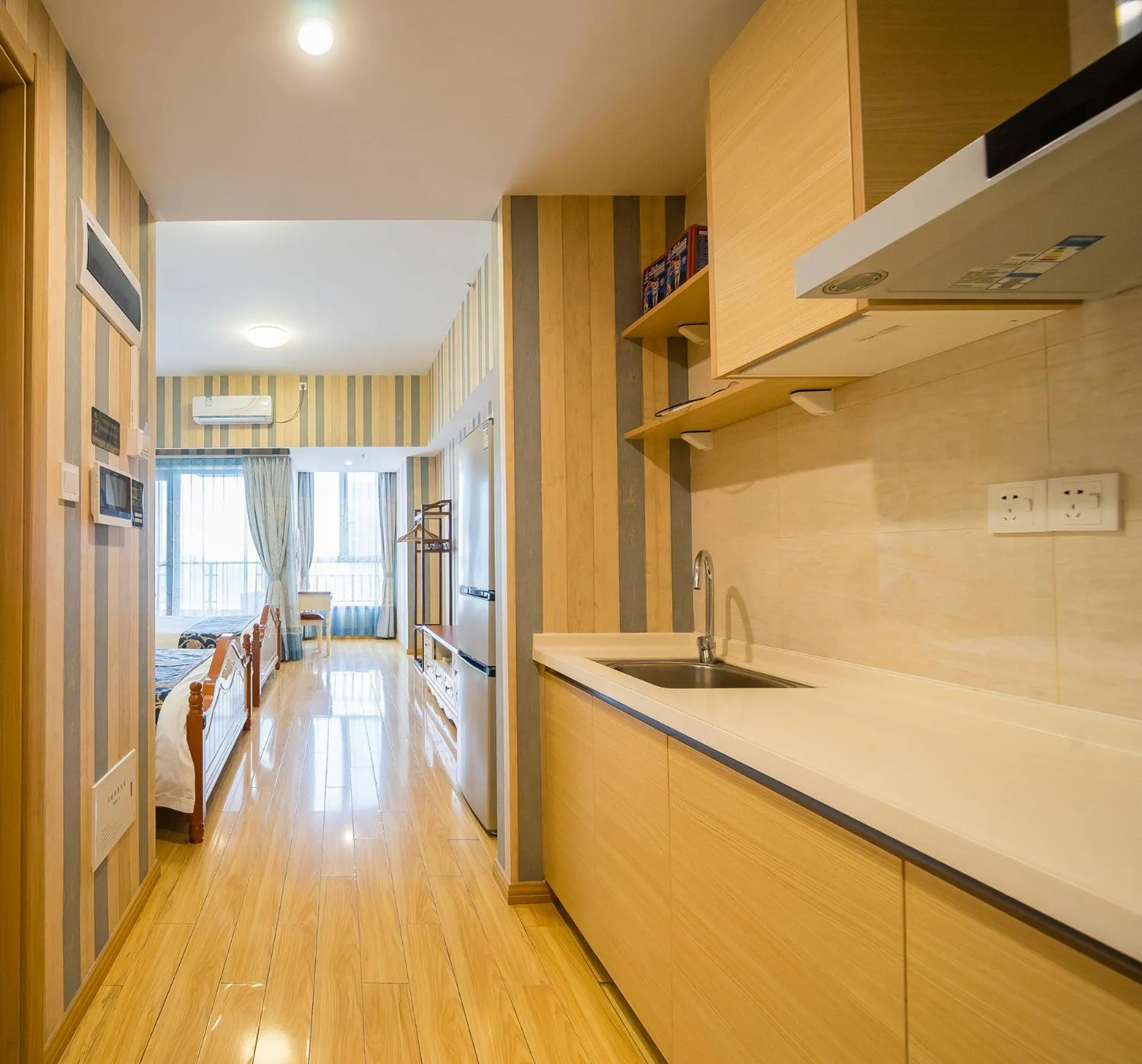Kitchen or kitchenette in Guangzhou Laiste ApartHotel Science City Greenland Central Plaza Branch - Free Shuttle Bus to Canton Fair Complex During Canton Fair Period