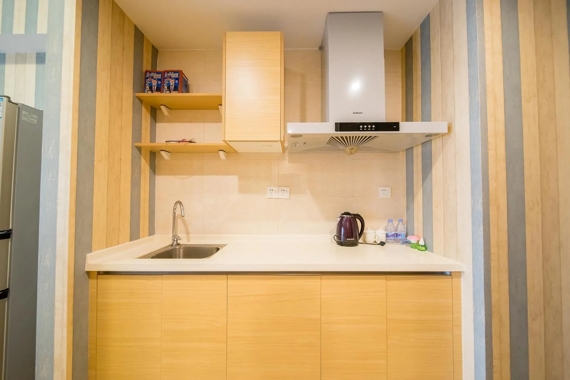 Kitchen or kitchenette in Guangzhou Laiste ApartHotel Science City Greenland Central Plaza Branch - Free Shuttle Bus to Canton Fair Complex During Canton Fair Period