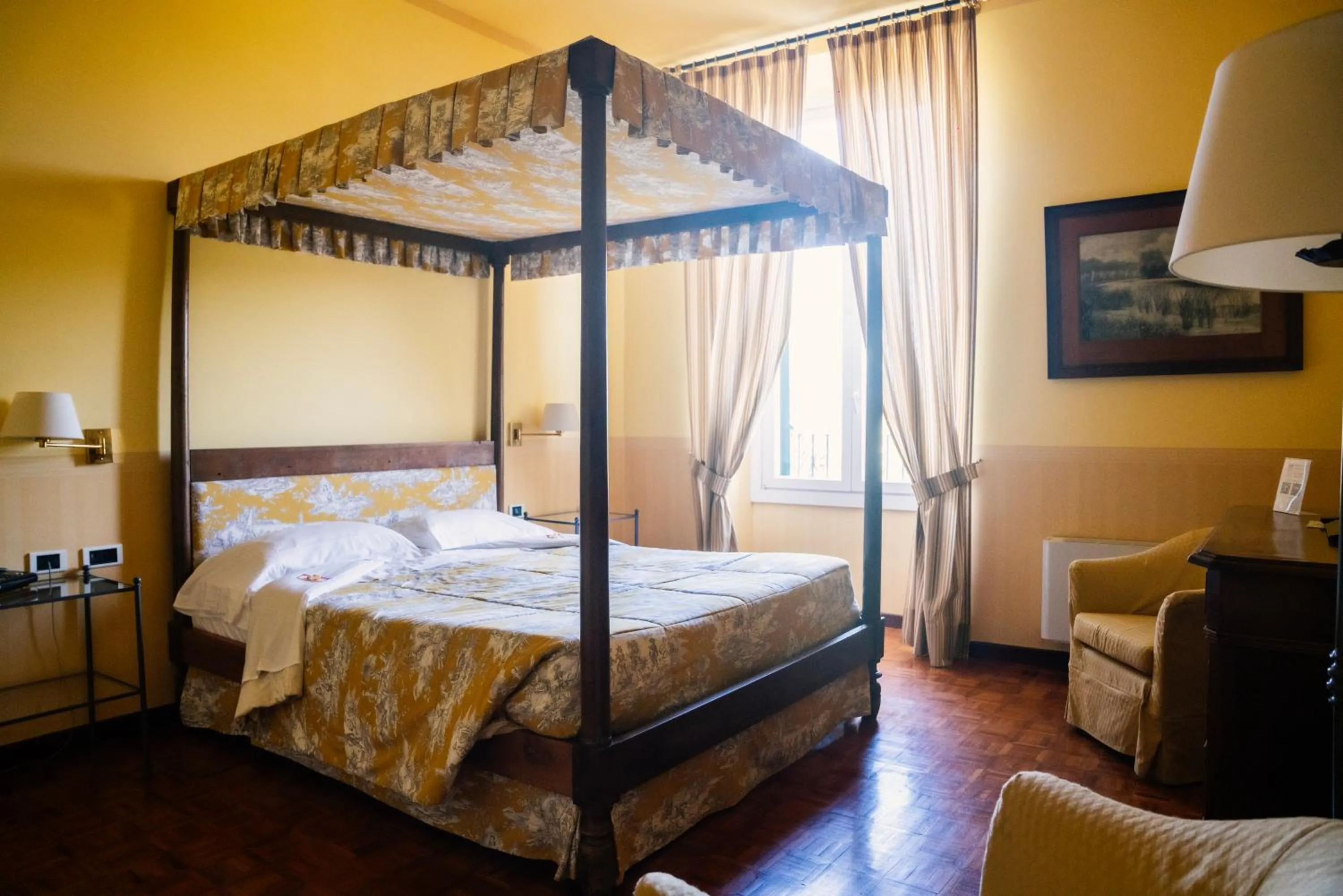 Bed in Relais Villa Pomela