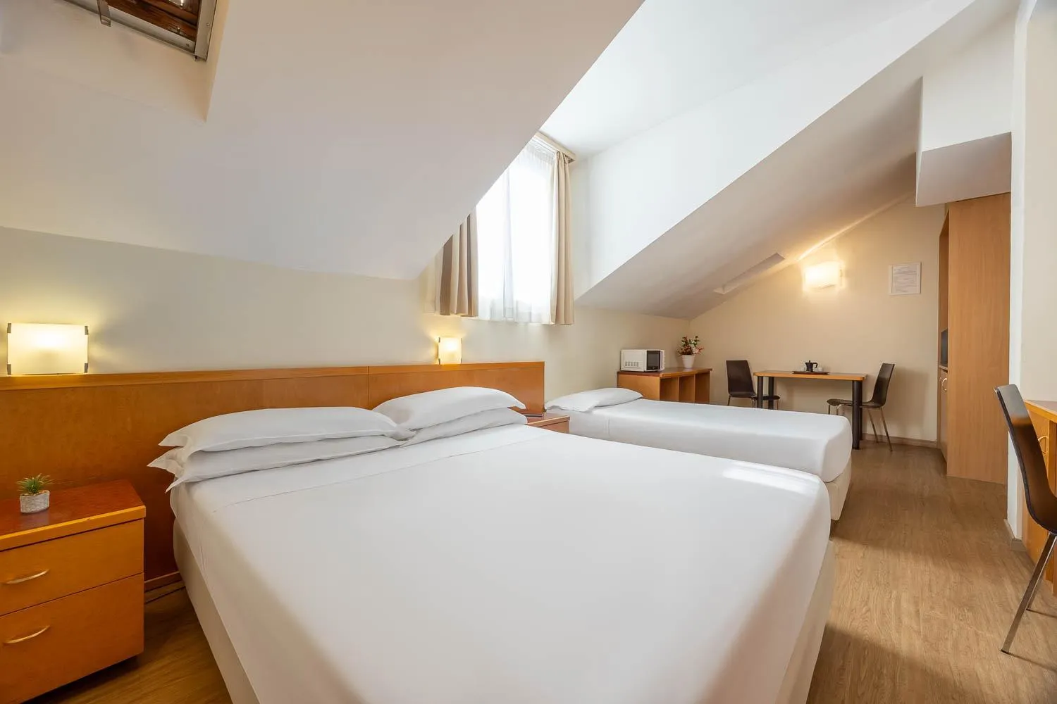 Bed in iH Hotels Milano ApartHotel Argonne Park