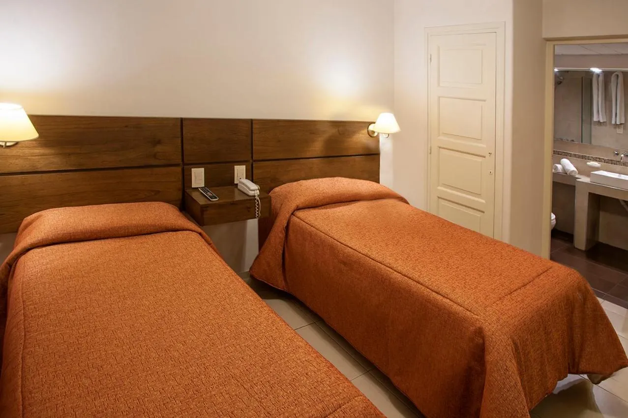 Bed in Hotel Carollo