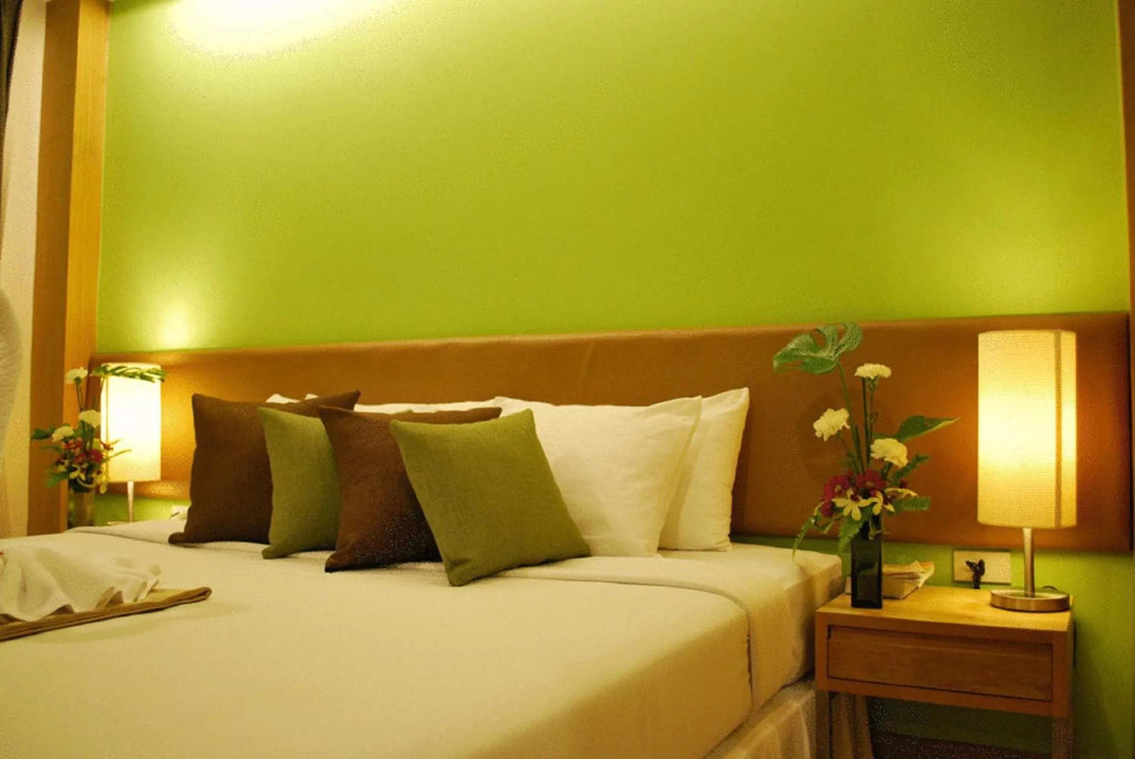 Bed in Windmill Resort Hotel Pattaya
