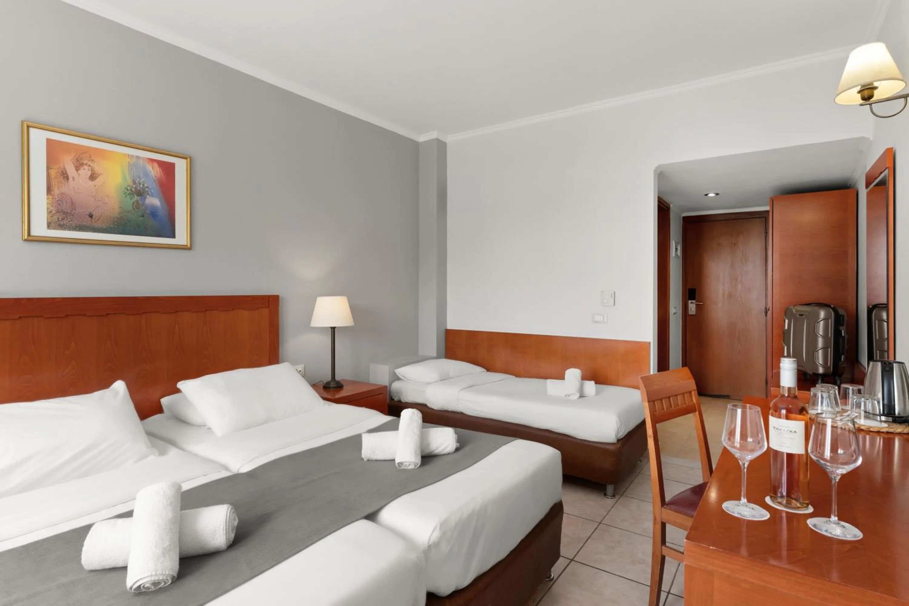 Bed in Ariti Grand Hotel