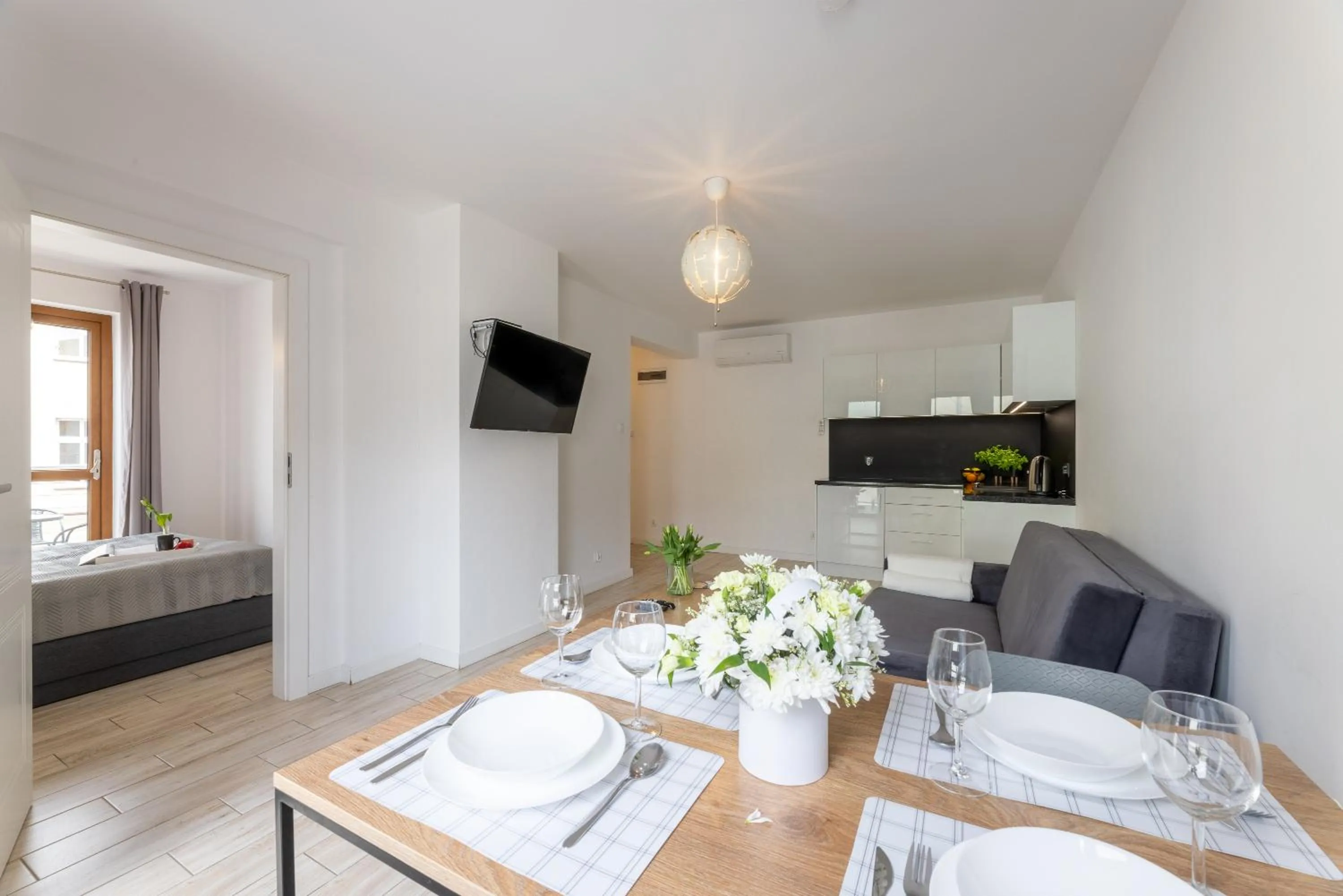 Living room in Apartamenty Bałtyckie - Grand Baltic - WIFI, Klimatyzacja, Sala Zabaw, Taras wypoczynkowy, centrum Ustki