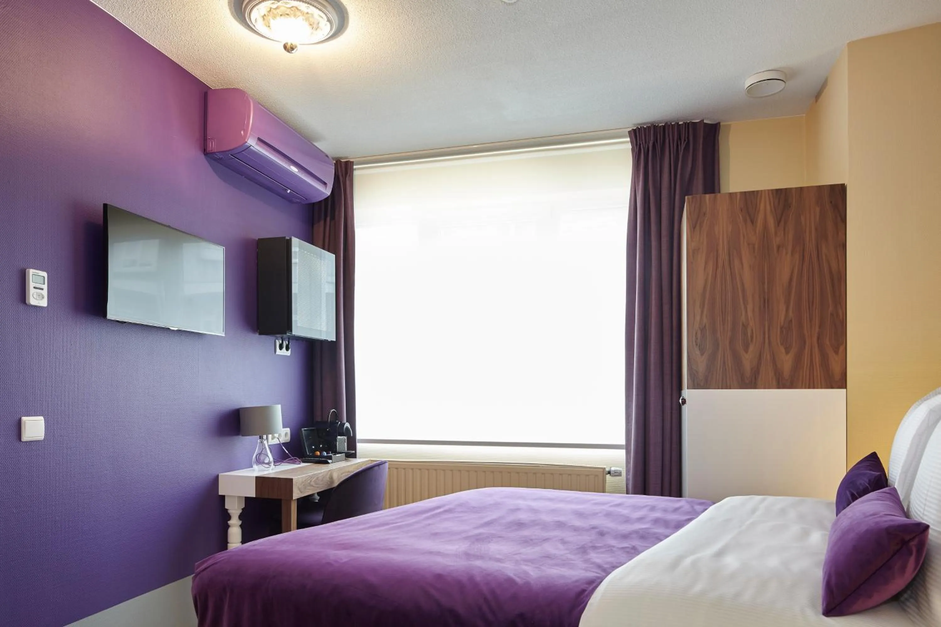 Photo of the whole room, Bed in The Muse Amsterdam - Boutique Hotel