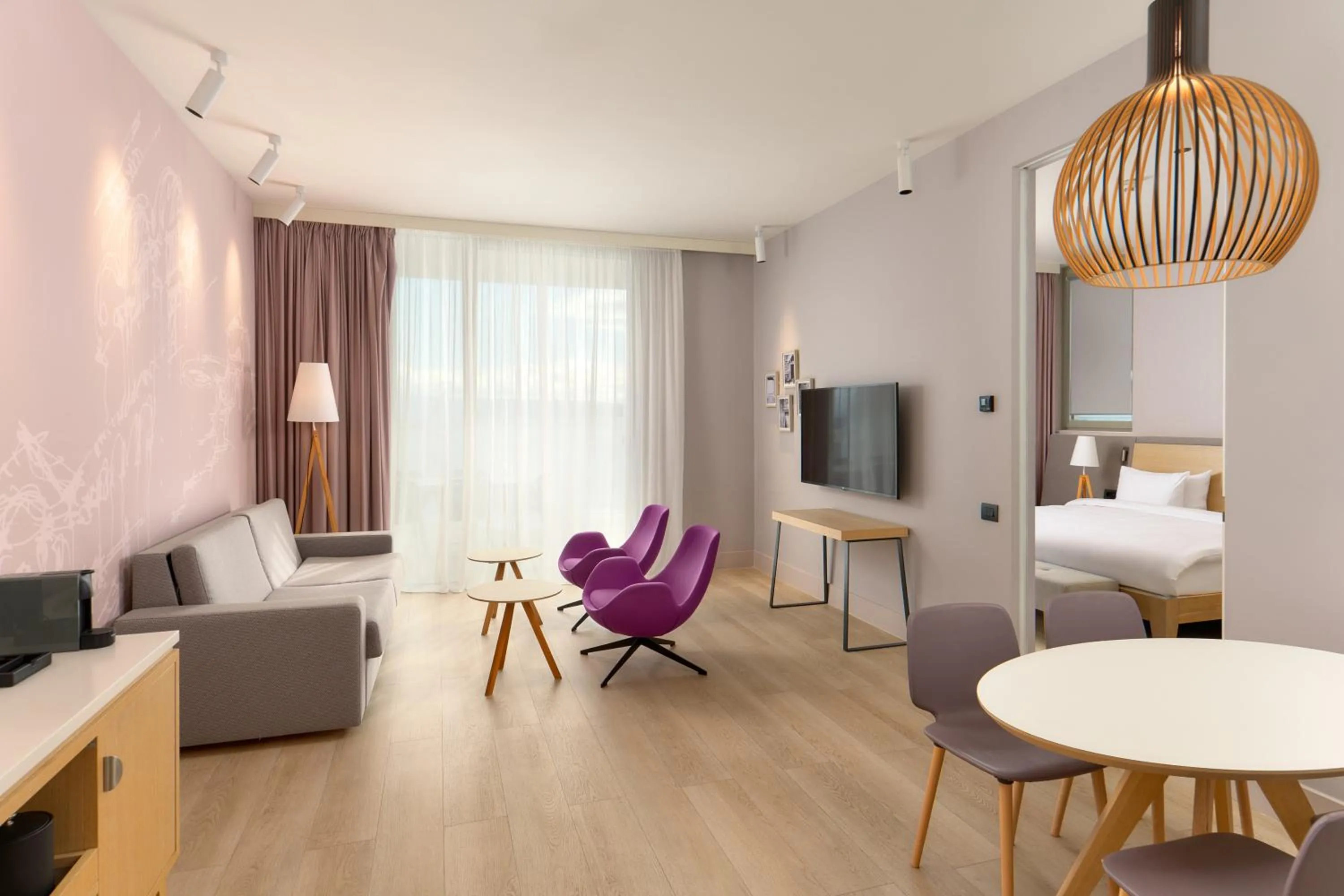 Living room, Bed in Radisson Blu Resort & Spa