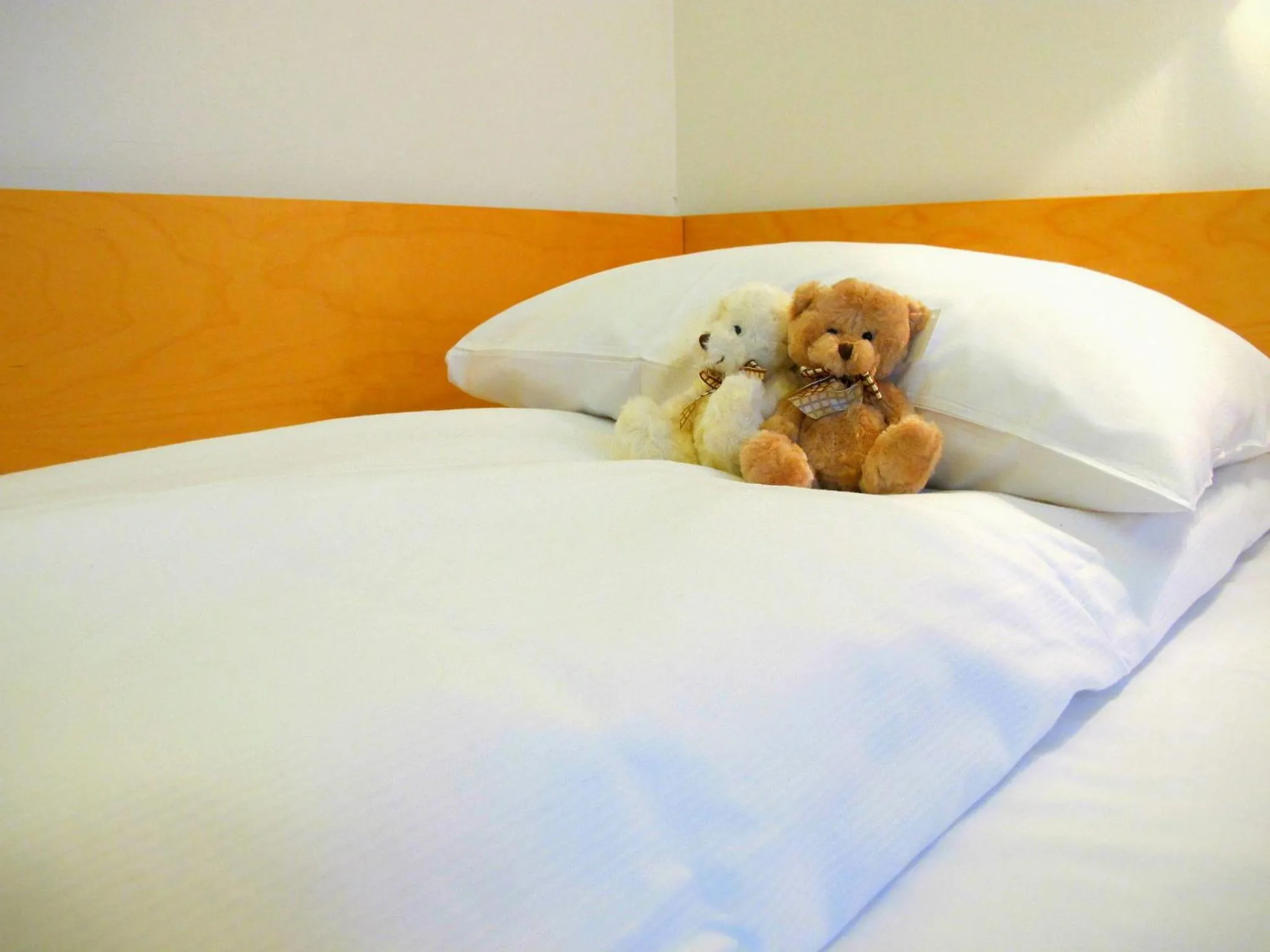 Bed in Hotel St. Olav