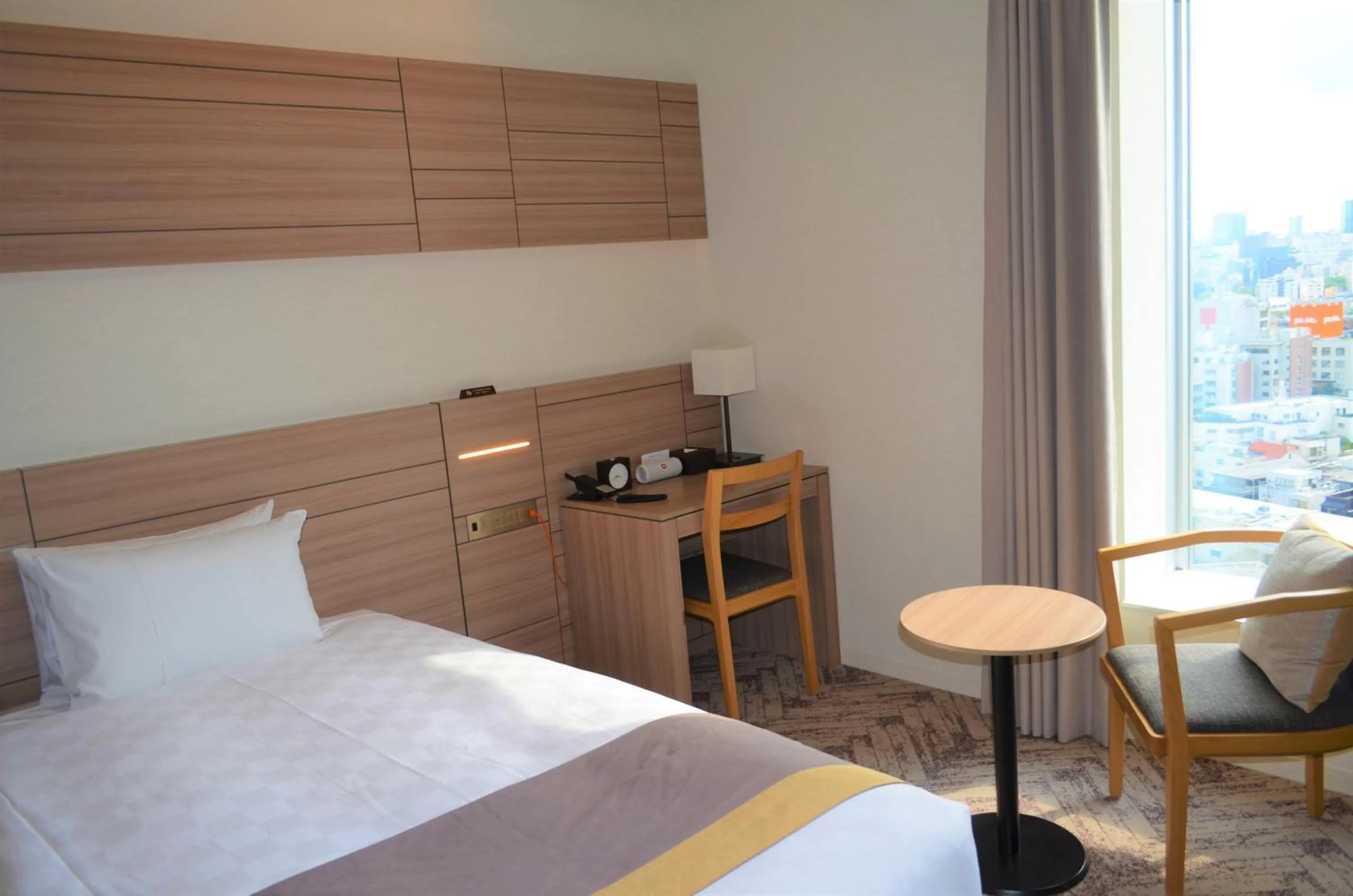 Bed in Nihon Seinenkan Hotel