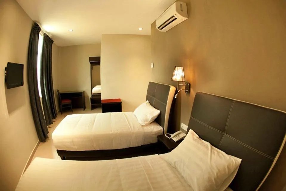 Bed in Ayer Hitam Hotel