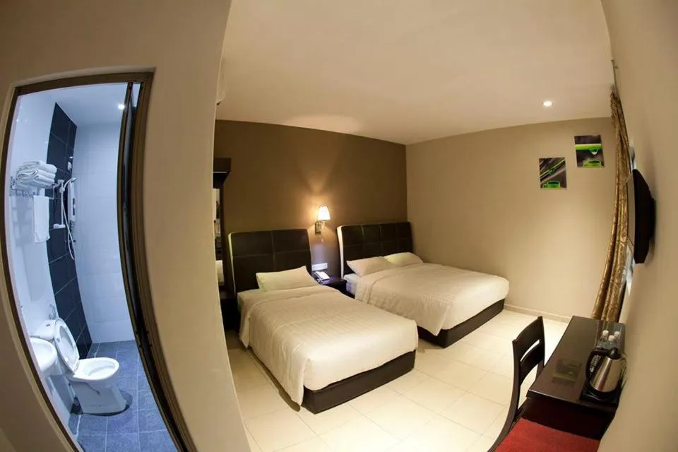 Bed in Ayer Hitam Hotel